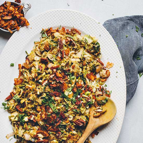 Platter of Brussels Sprout Slaw topped with Coconut Bacon