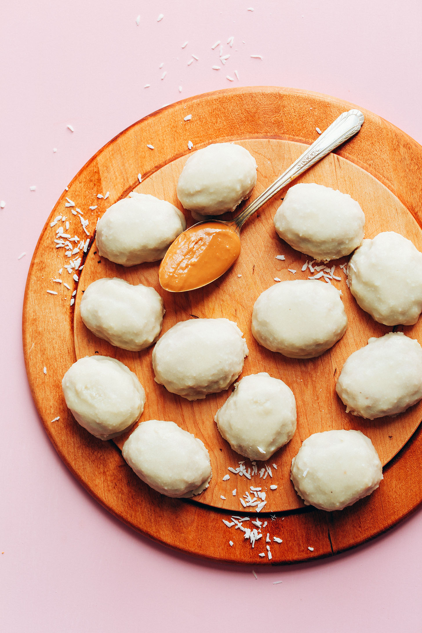 Vegan White Chocolate Peanut Butter Eggs on a wood cutting board for an Easter celebration