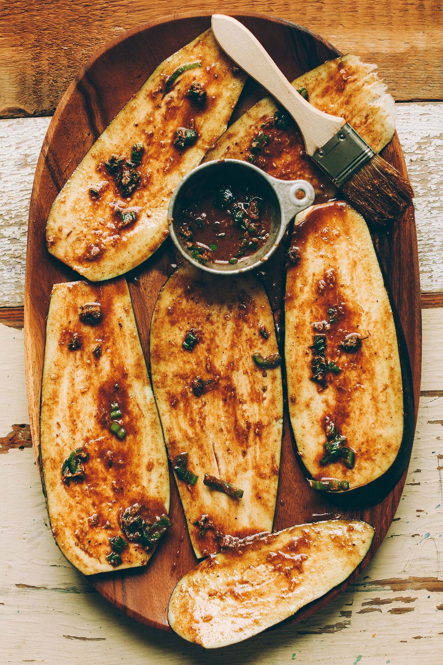 Thinly sliced eggplant slathered with gluten-free homemade Jamaican Jerk dressing