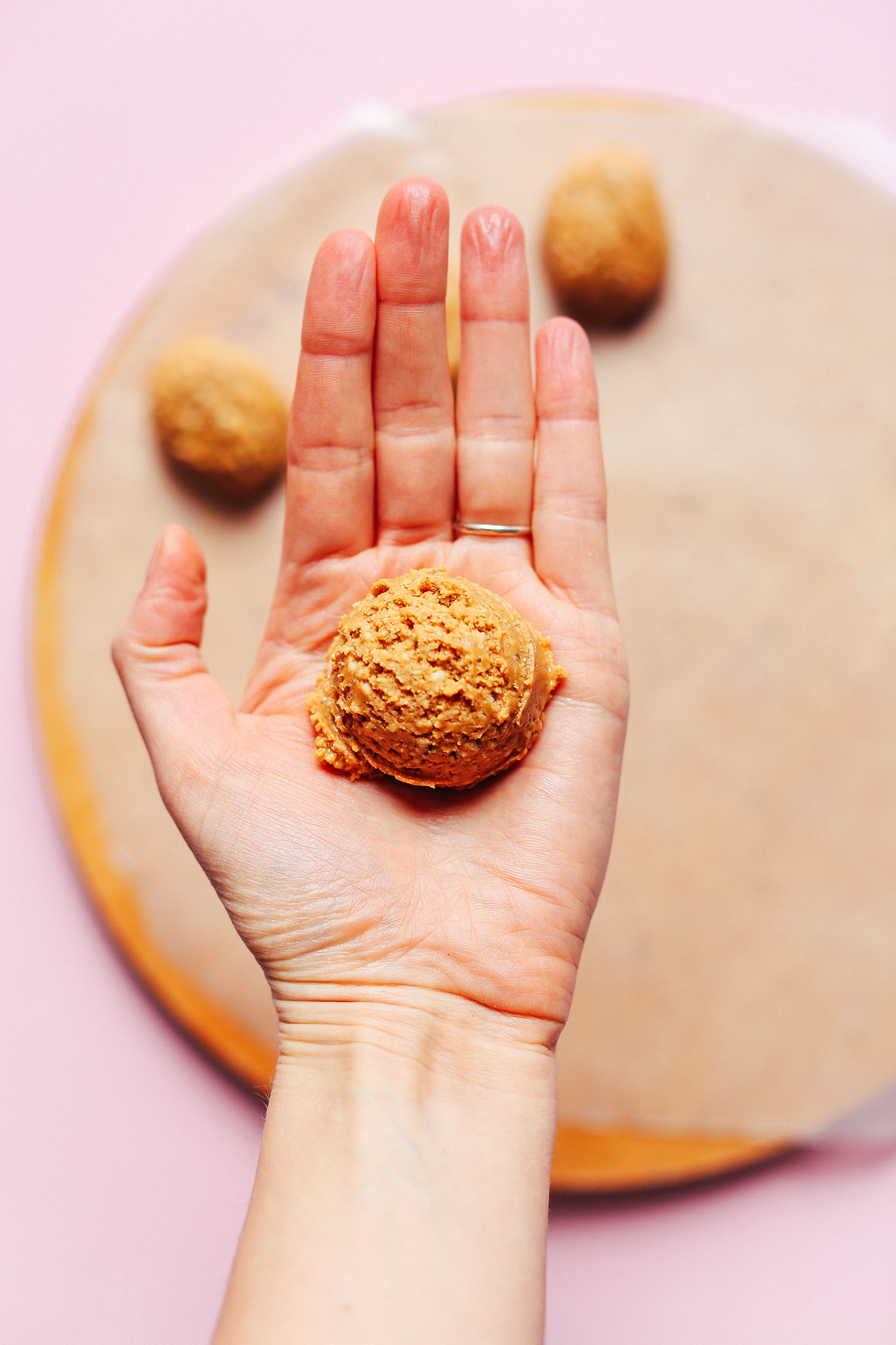 Mound-shaped scoop of peanut butter mixture for Vegan White Chocolate Peanut Butter Eggs