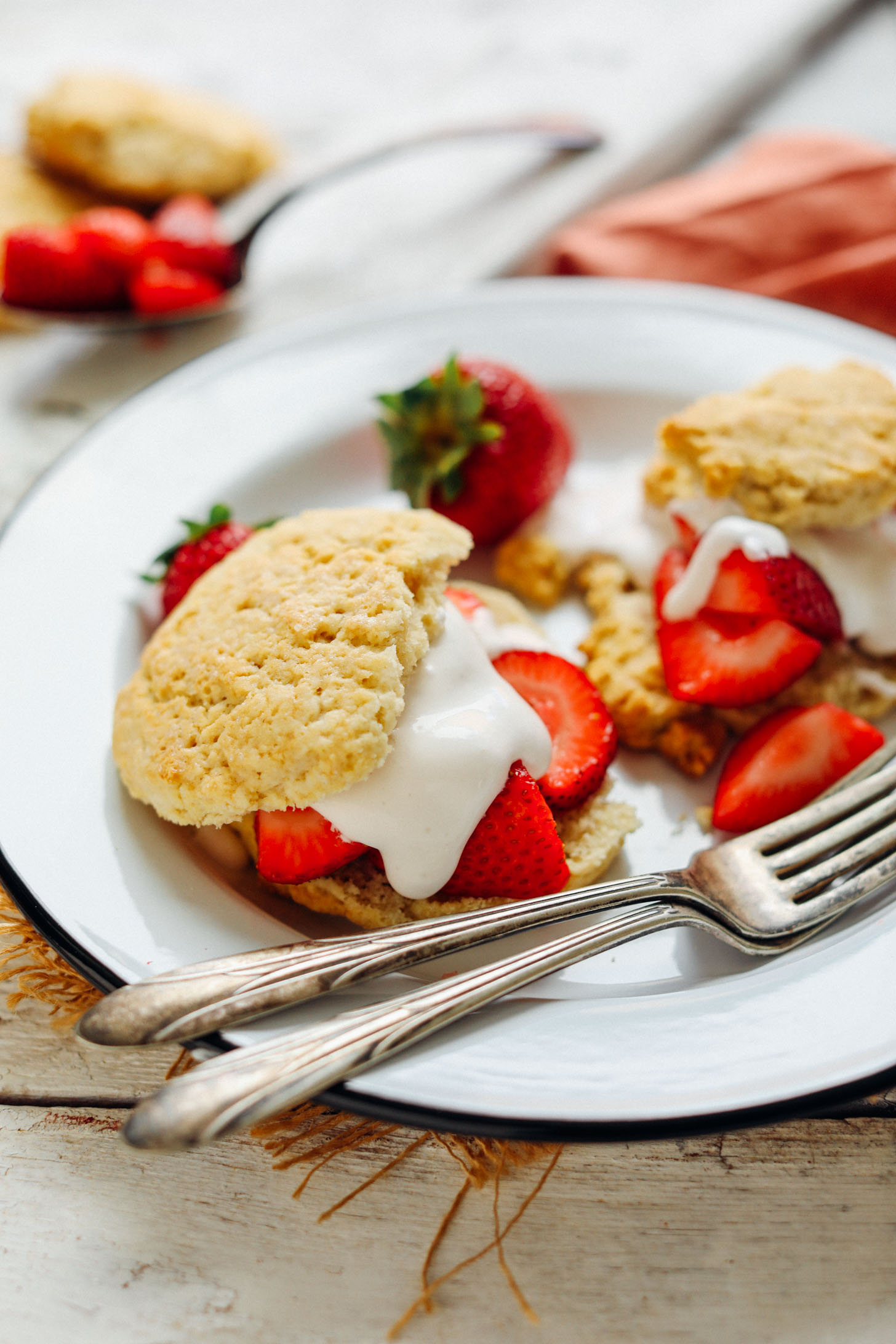 Forks on a plate filled with Vegan GF Strawberry Shortcake