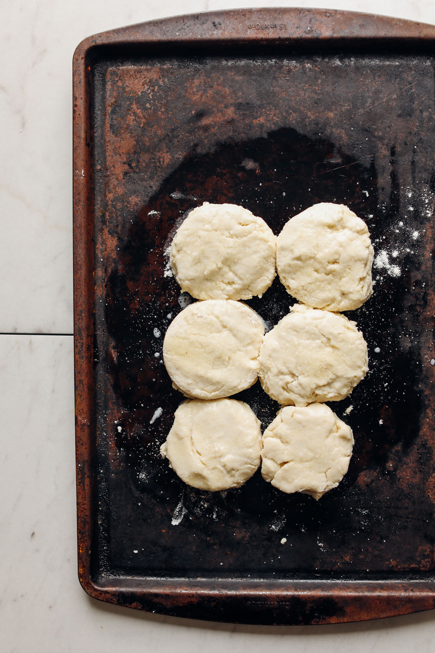 Oiled baking sheet with Vegan GF Shortcake Biscuits
