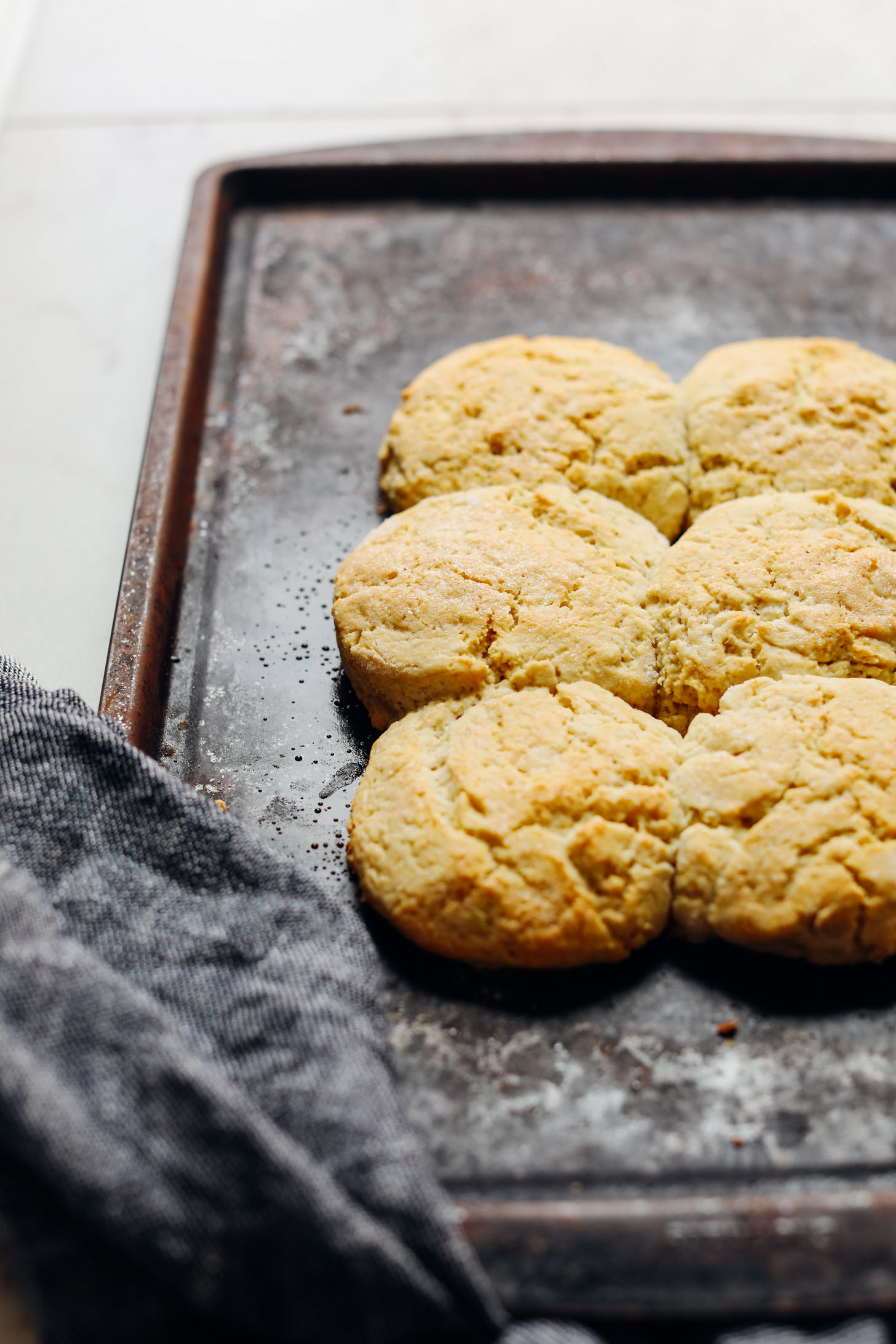 Baking sheet with freshly baked Vegan Gluten-Free Strawberry Shortcake Biscuits
