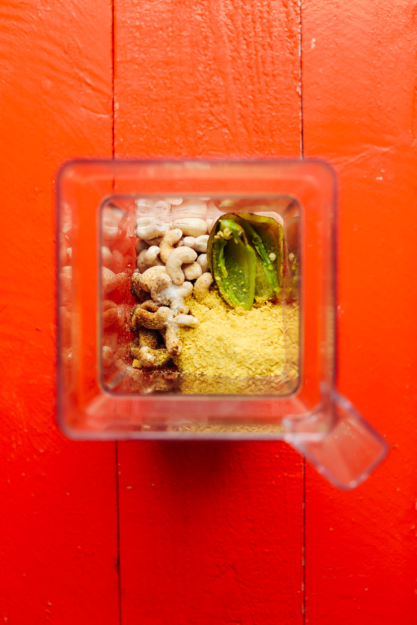 Blender with ingredients for making our gluten-free Vegan Queso recipe