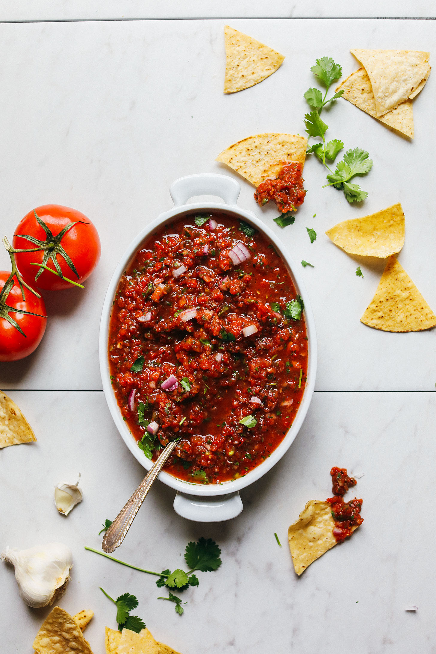 White ceramic dish with vibrant homemade Red Salsa