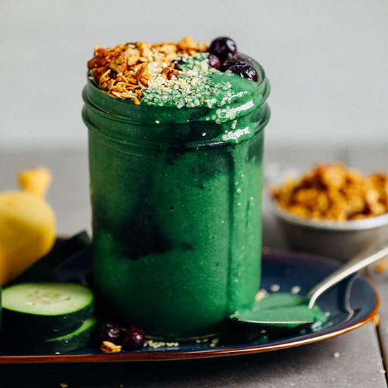 Overflowing jar of our vegan Super Green Spirulina Smoothie