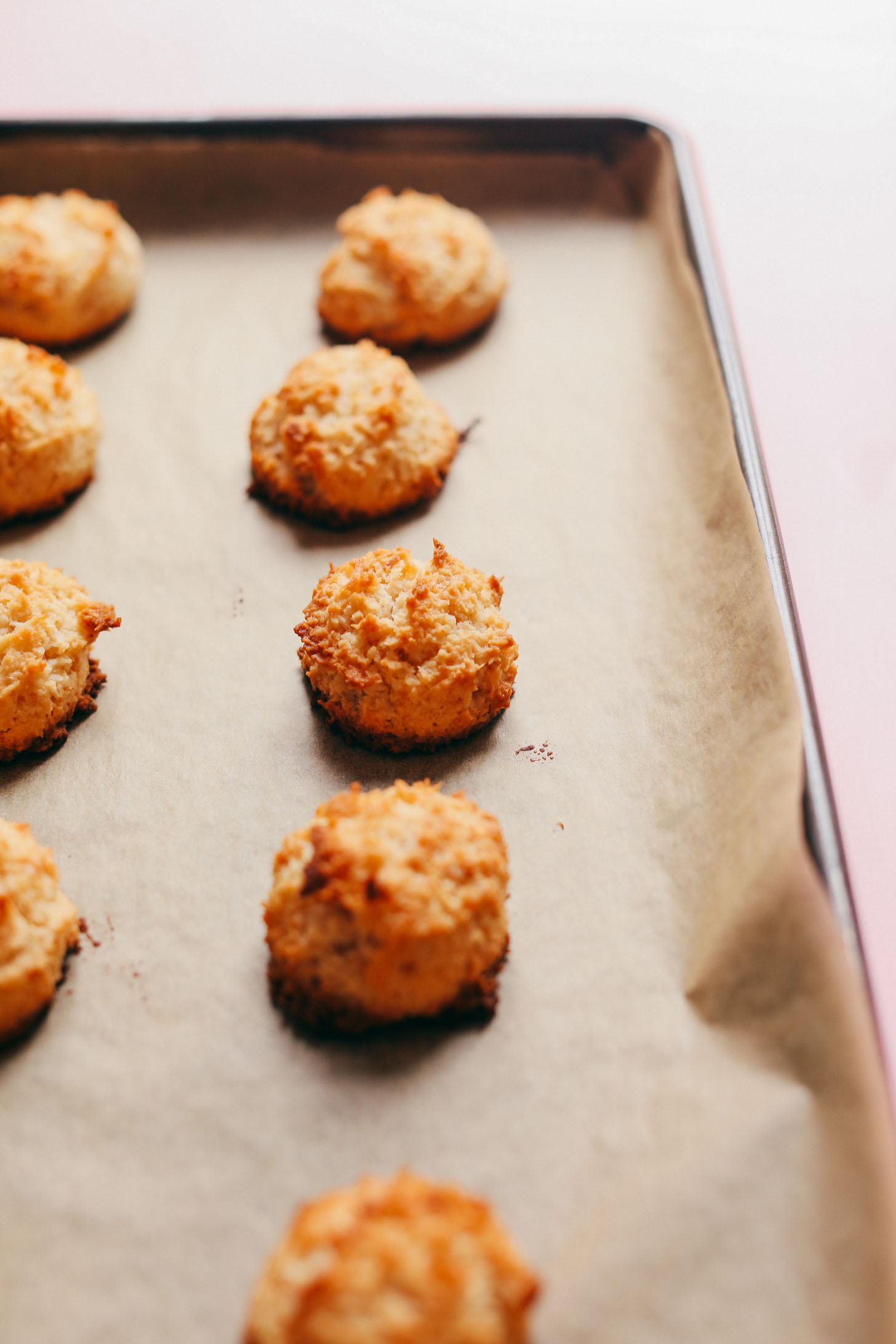 Parchment-lined baking sheet with Vegan Coconut Macaroons