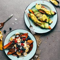 Two plates of Baked Sweet Potatoes with one having savory toppings and the other sweet
