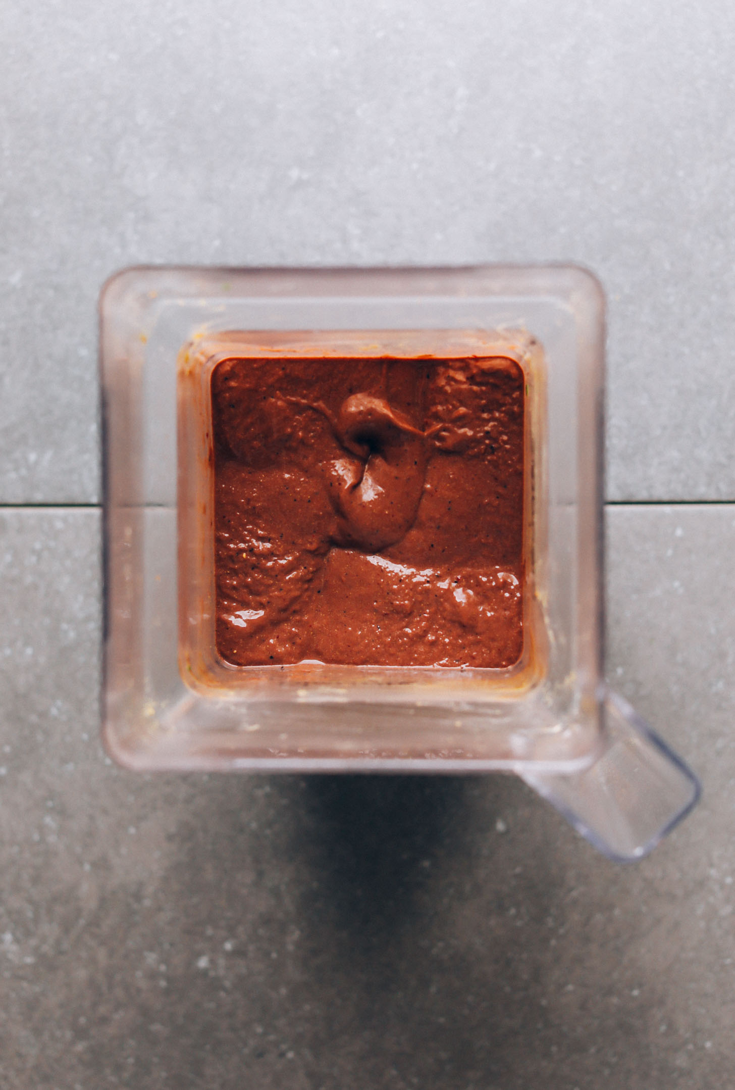 Freshly blended mixture for Peanut Butter & Jelly Acai Bowls