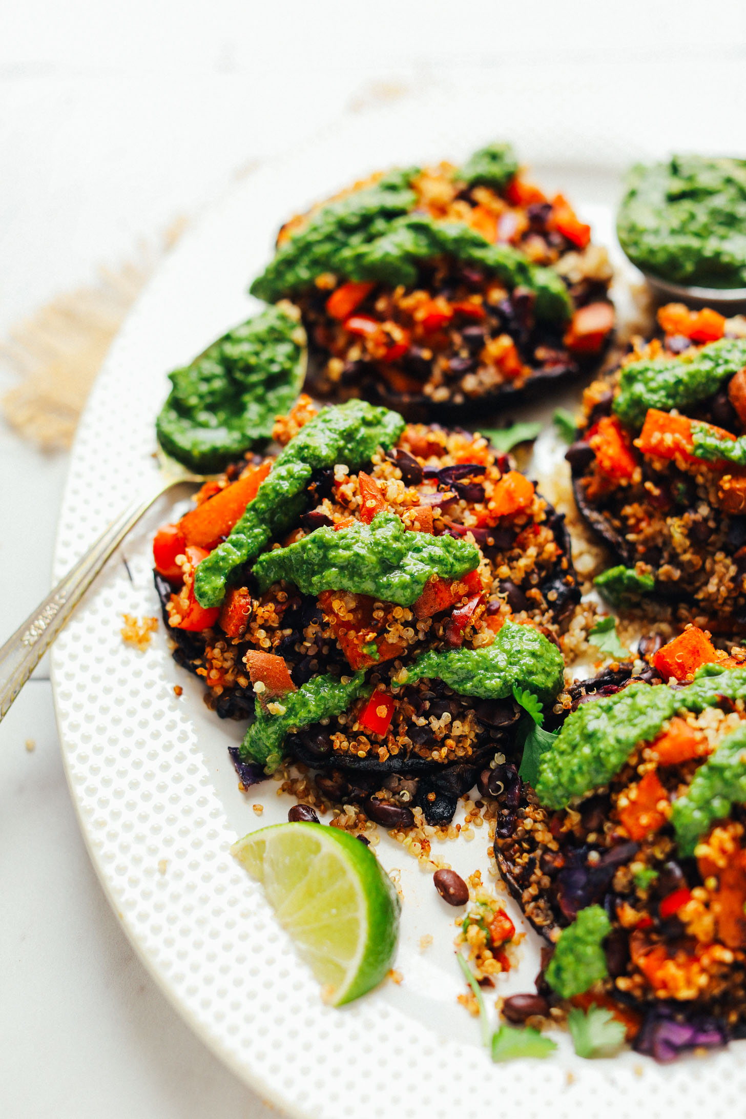Serving platter with gluten-free vegan Vegetable Quinoa Stuffed Portobello Mushrooms