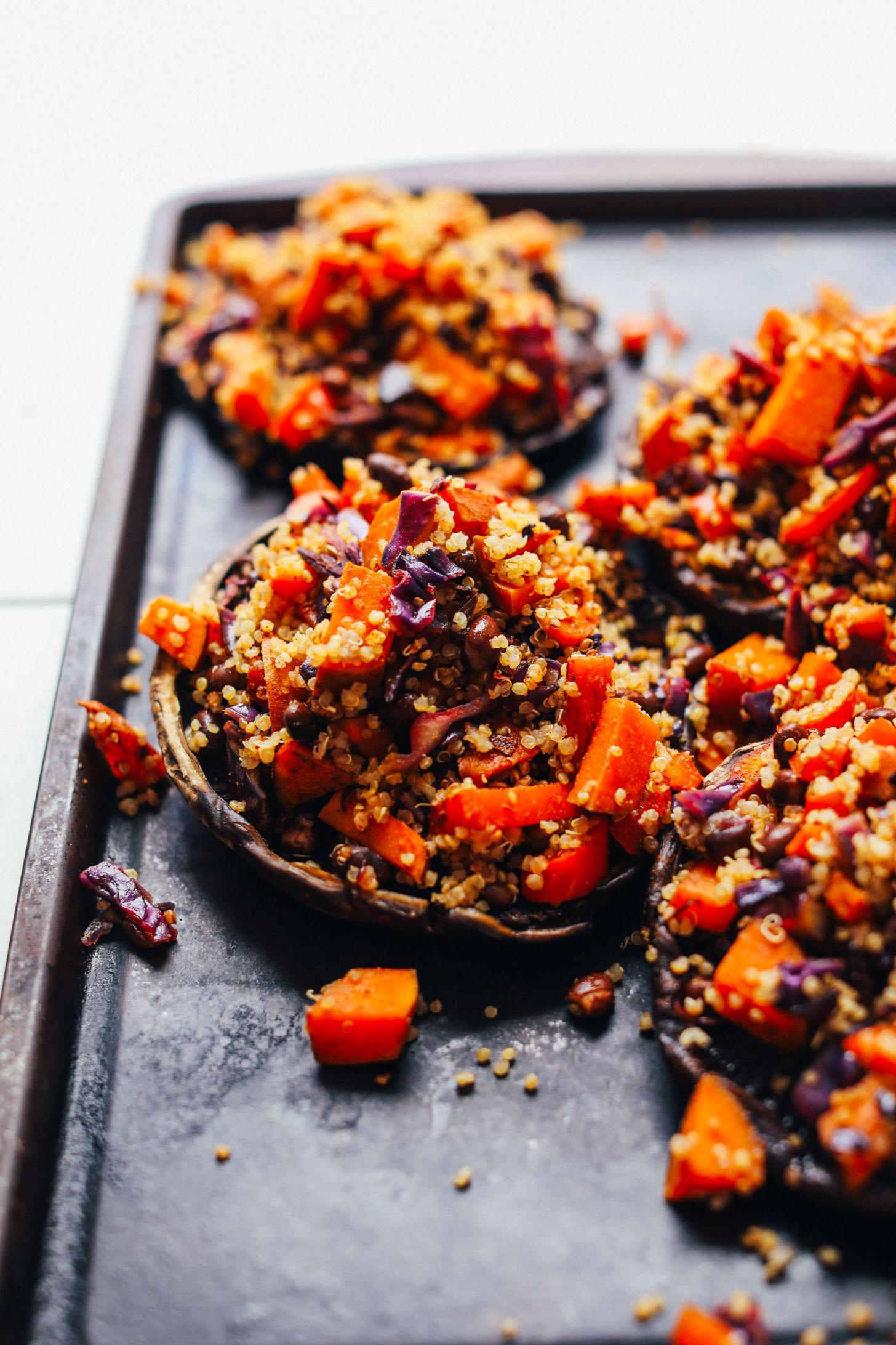 Baking sheet with Portobello Mushrooms loaded with a plant-based filling