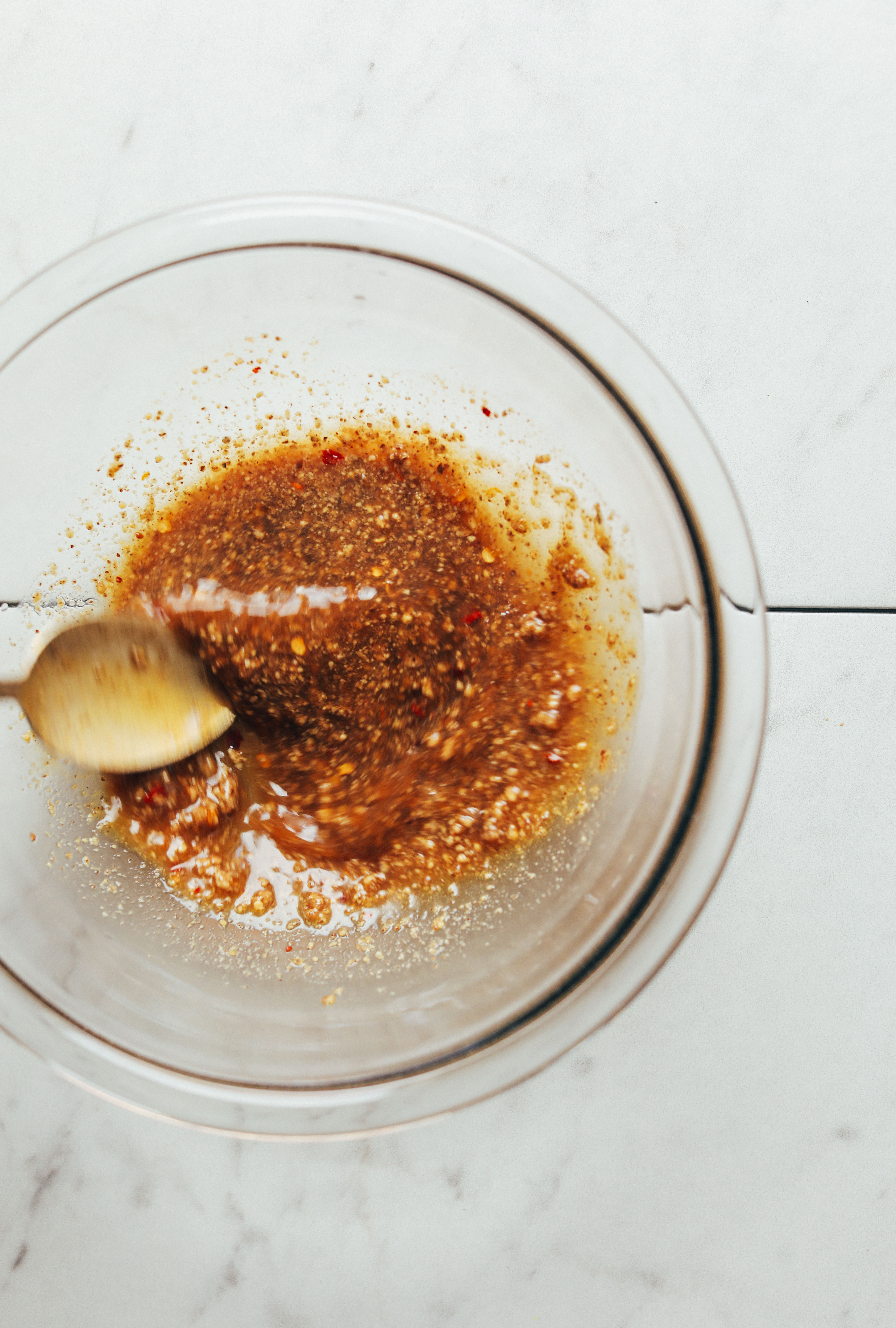 Stirring the ingredients for homemade gluten-free vegan Pad Thai Sauce