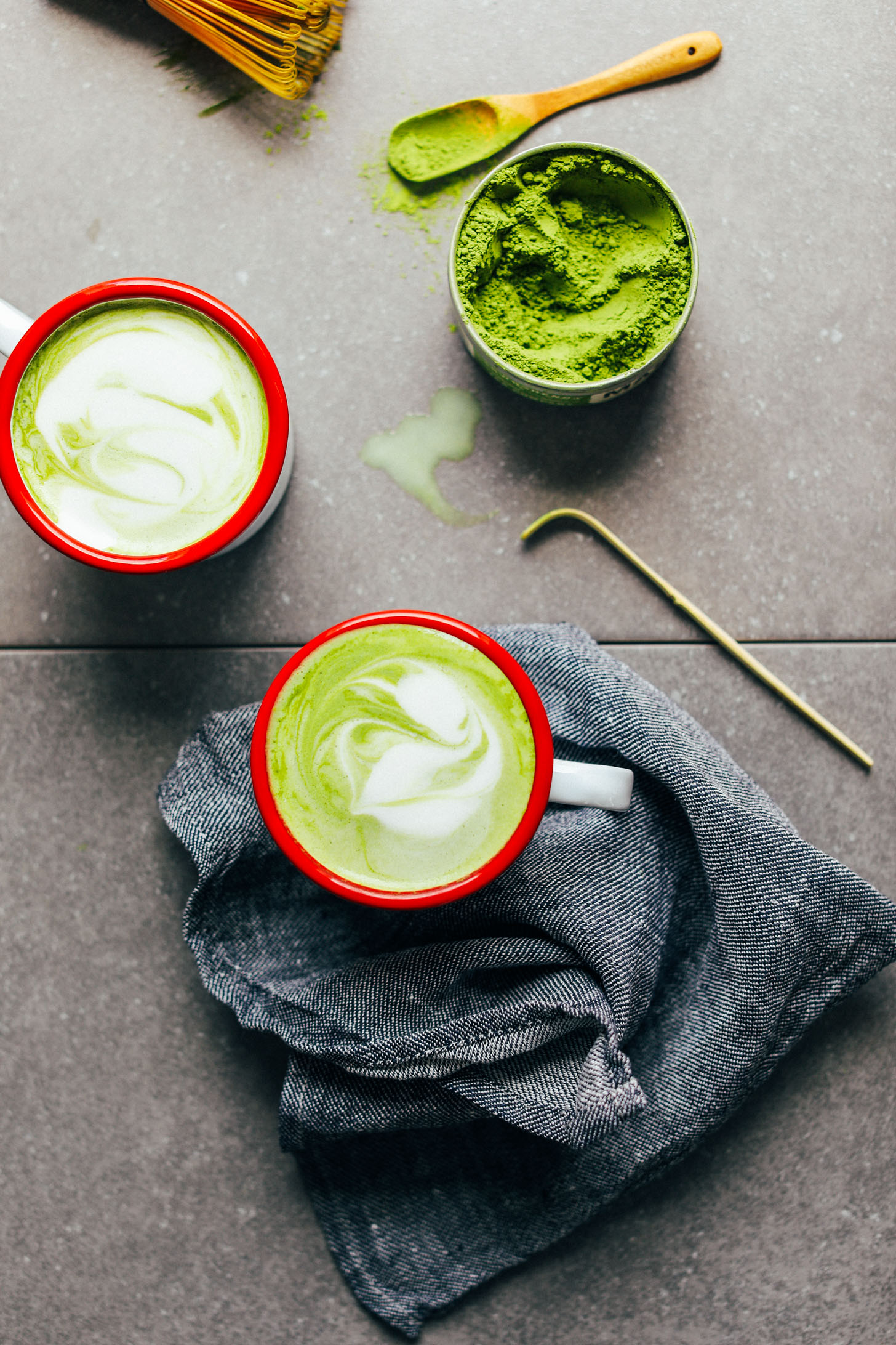 Two mugs of the best vegan Matcha Latte made from coconut and macadamia nut milks