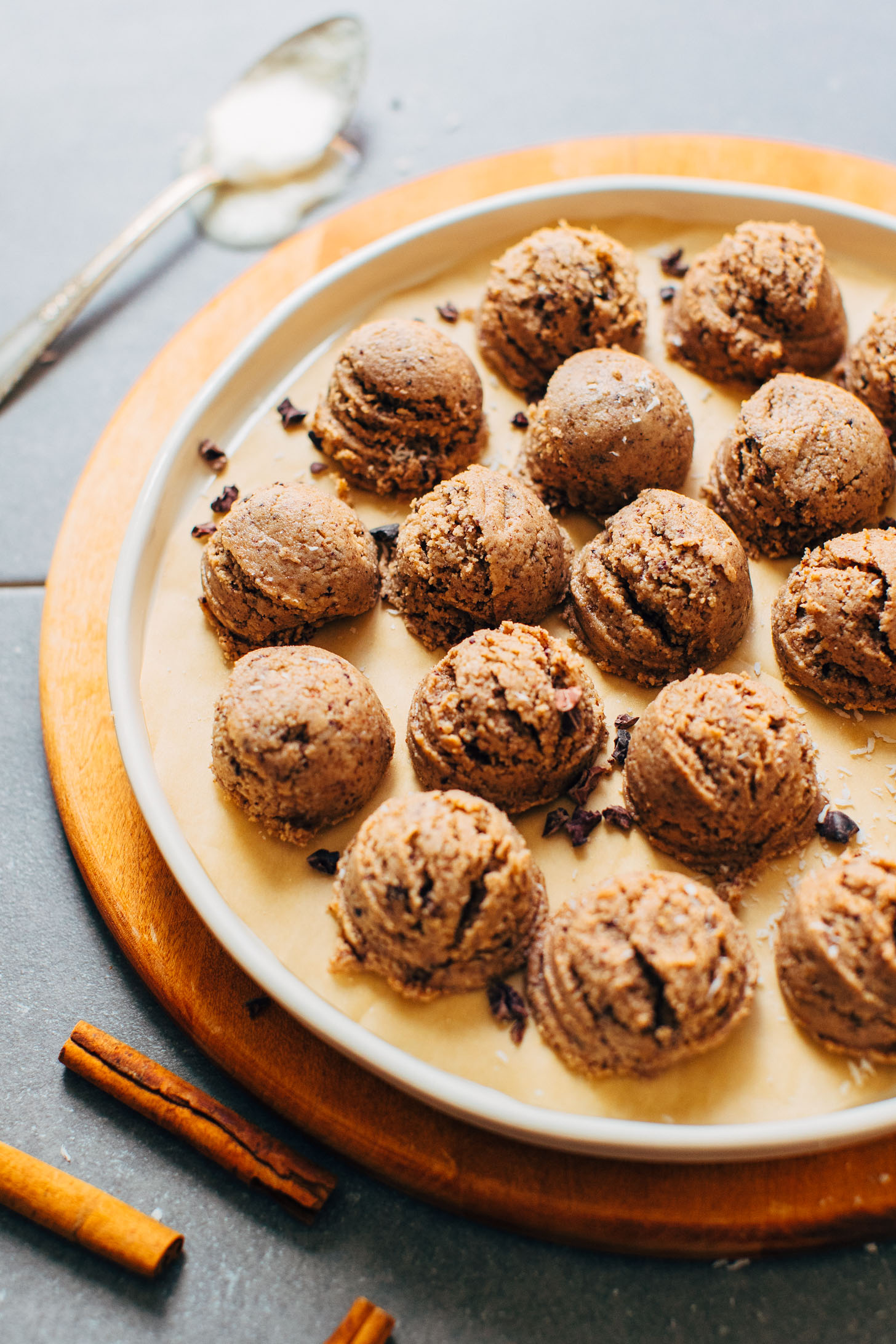 Plate full of satisfying vegan Coconut Cacao Tahini Snack Bites