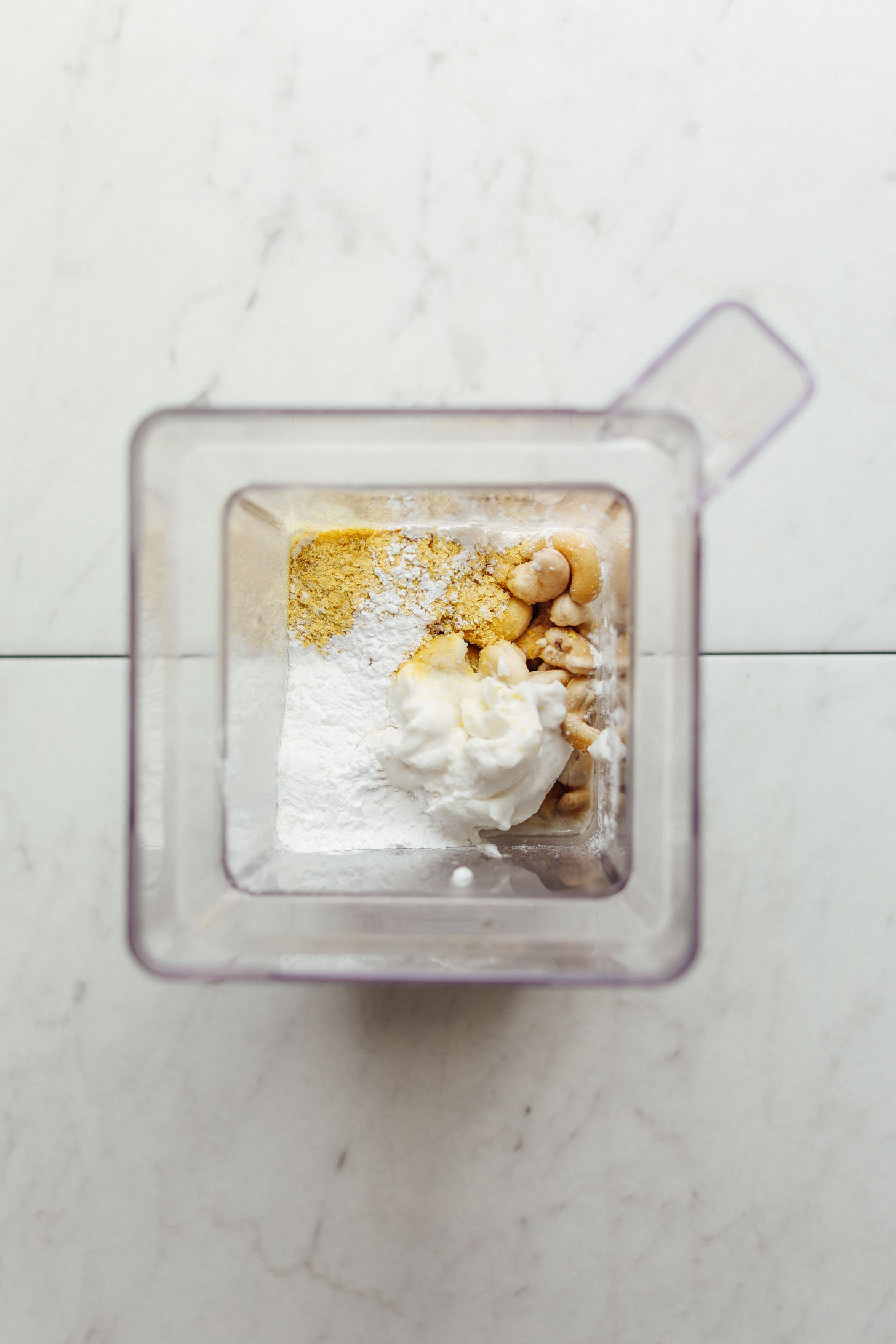 Blender with ingredients for making Vegan Mozzarella Cheese
