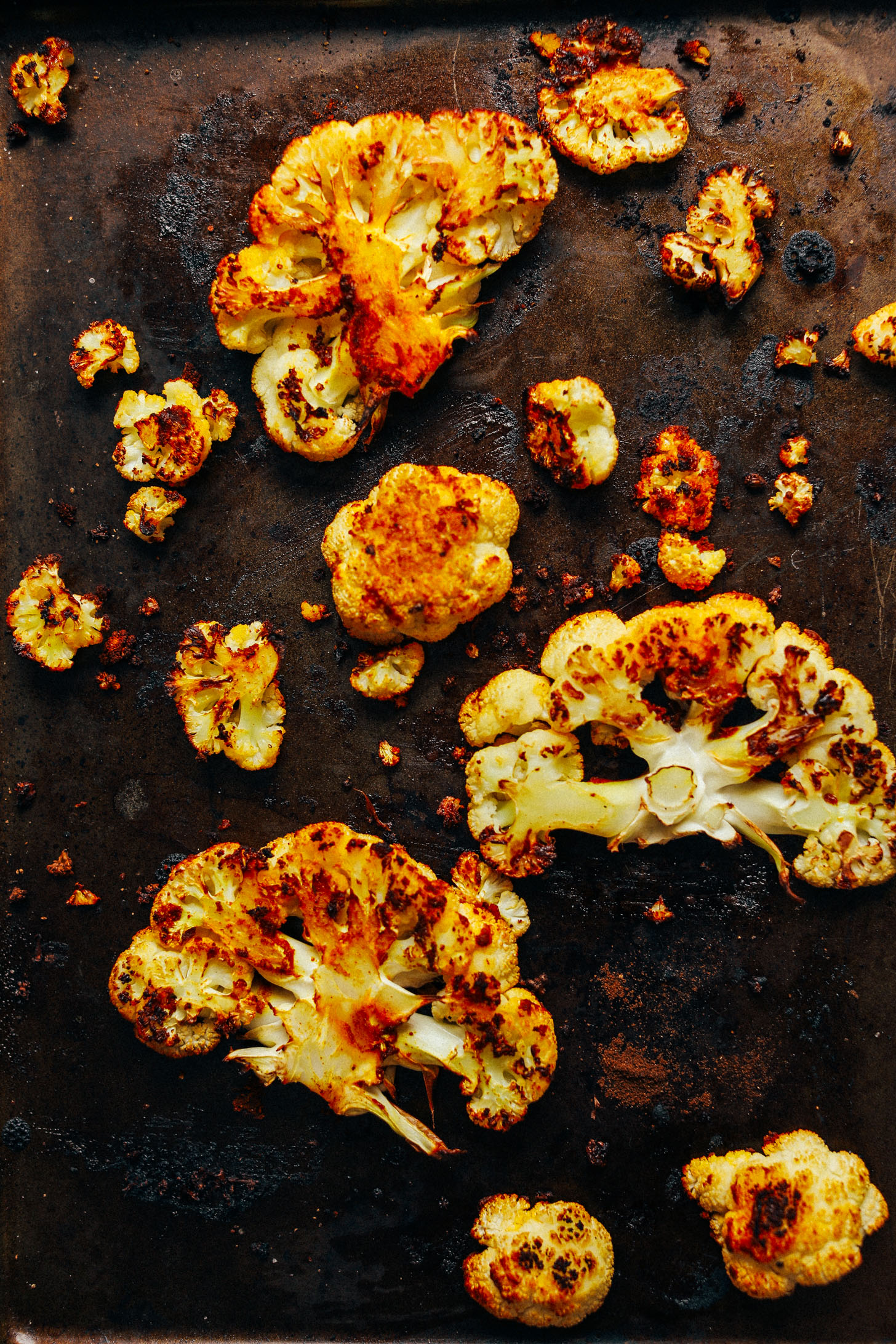 Baking sheet with freshly roasted shawarma-seasoned Cauliflower Steaks