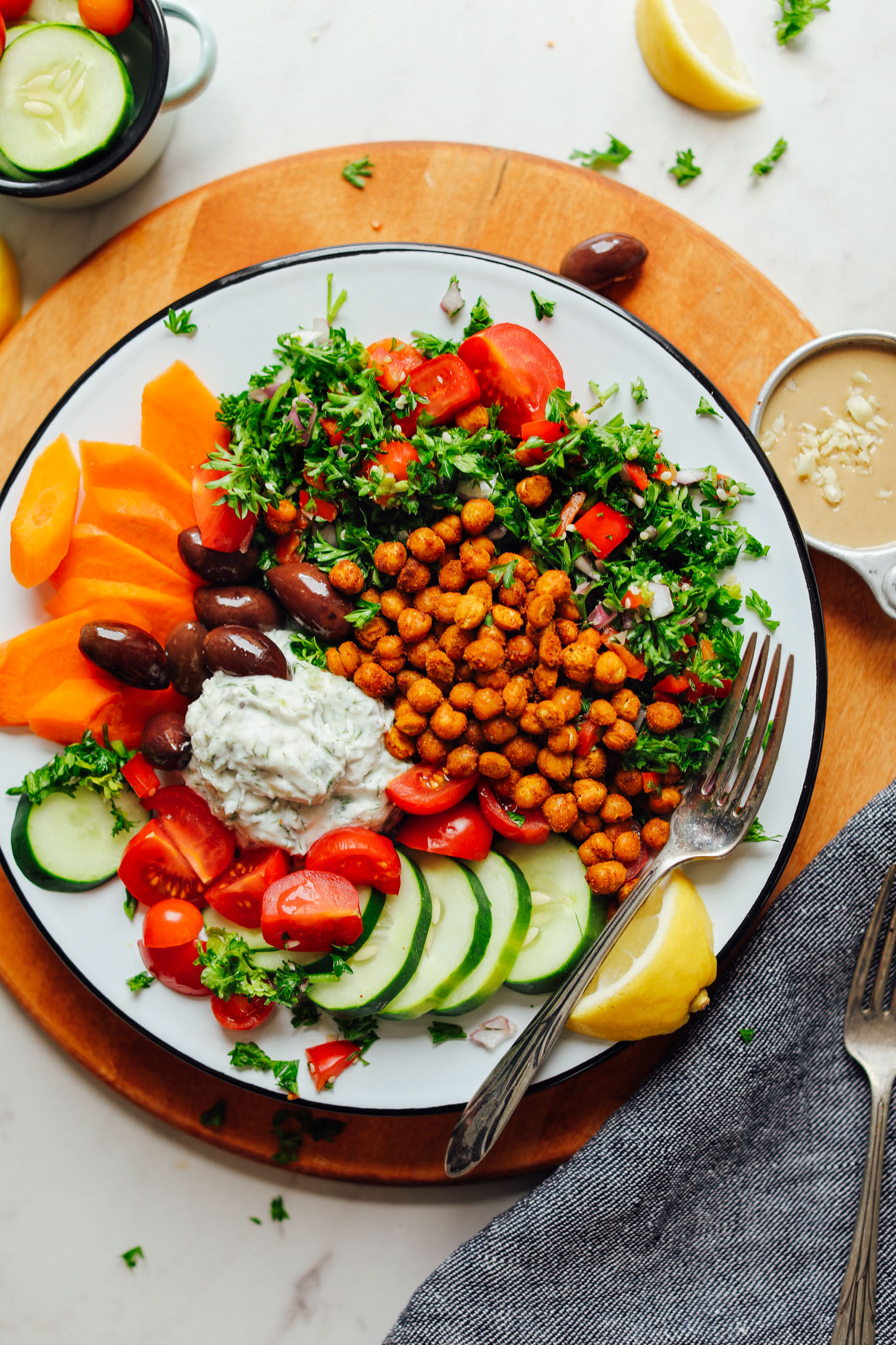 Large serving of our gluten-free Vegan Greek Bowl with Crispy Chickpeas, Vegan Tzatziki, and Veggies