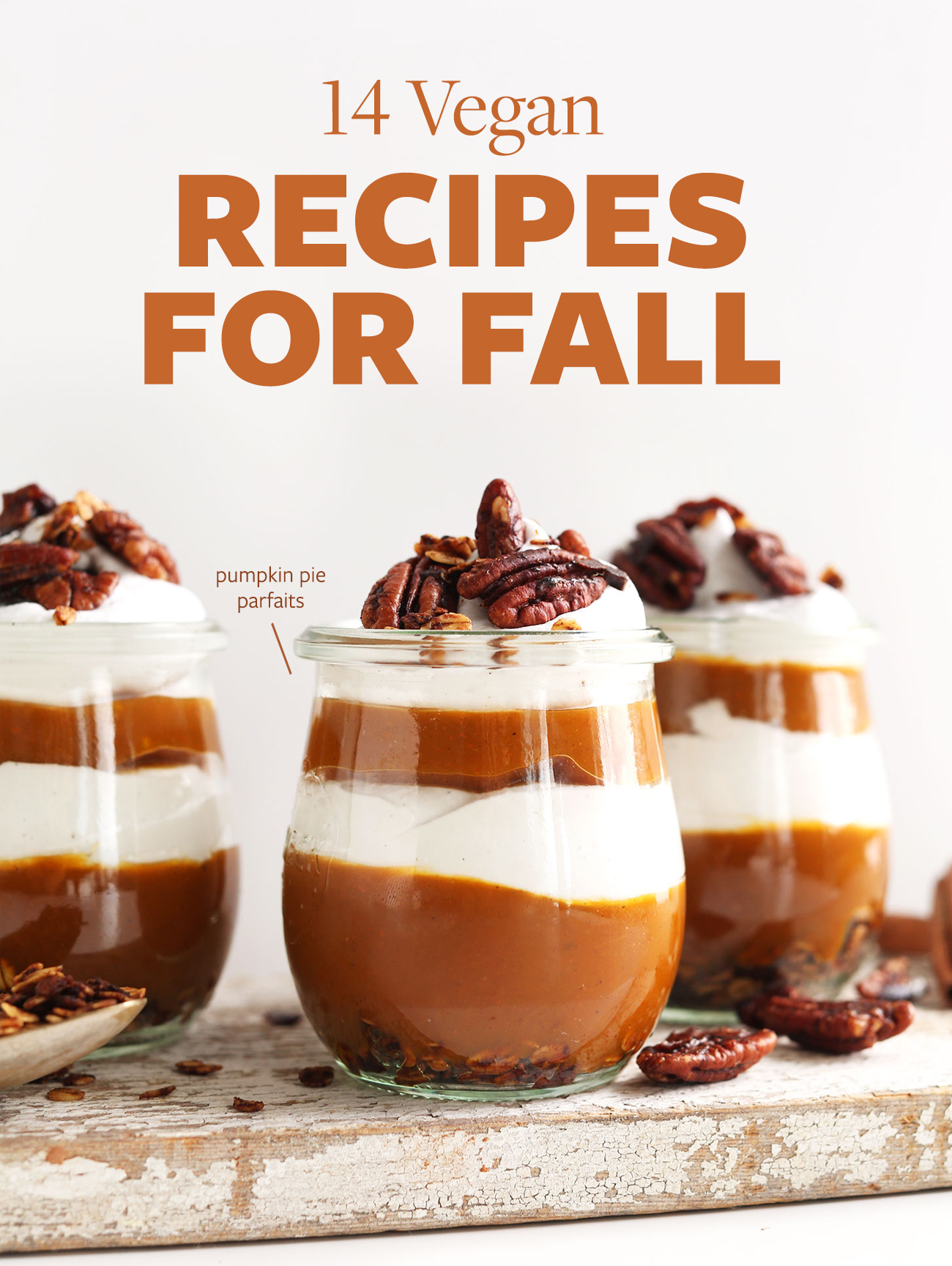 Pumpkin pie parfaits on a wood plank for our 14 Vegan Recipes for Fall roundup