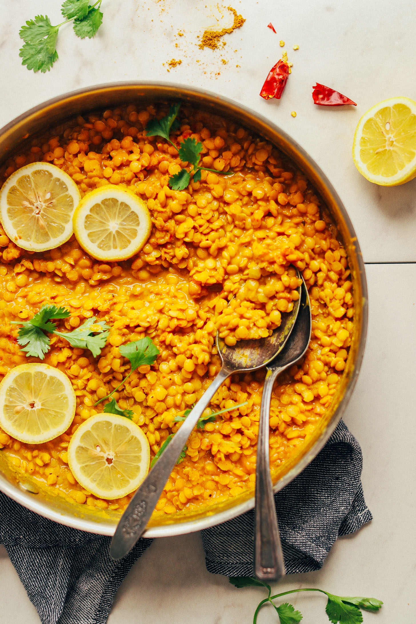 Large pan of Coconut Curried Golden Lentils ready to be served up for a plant-based meal