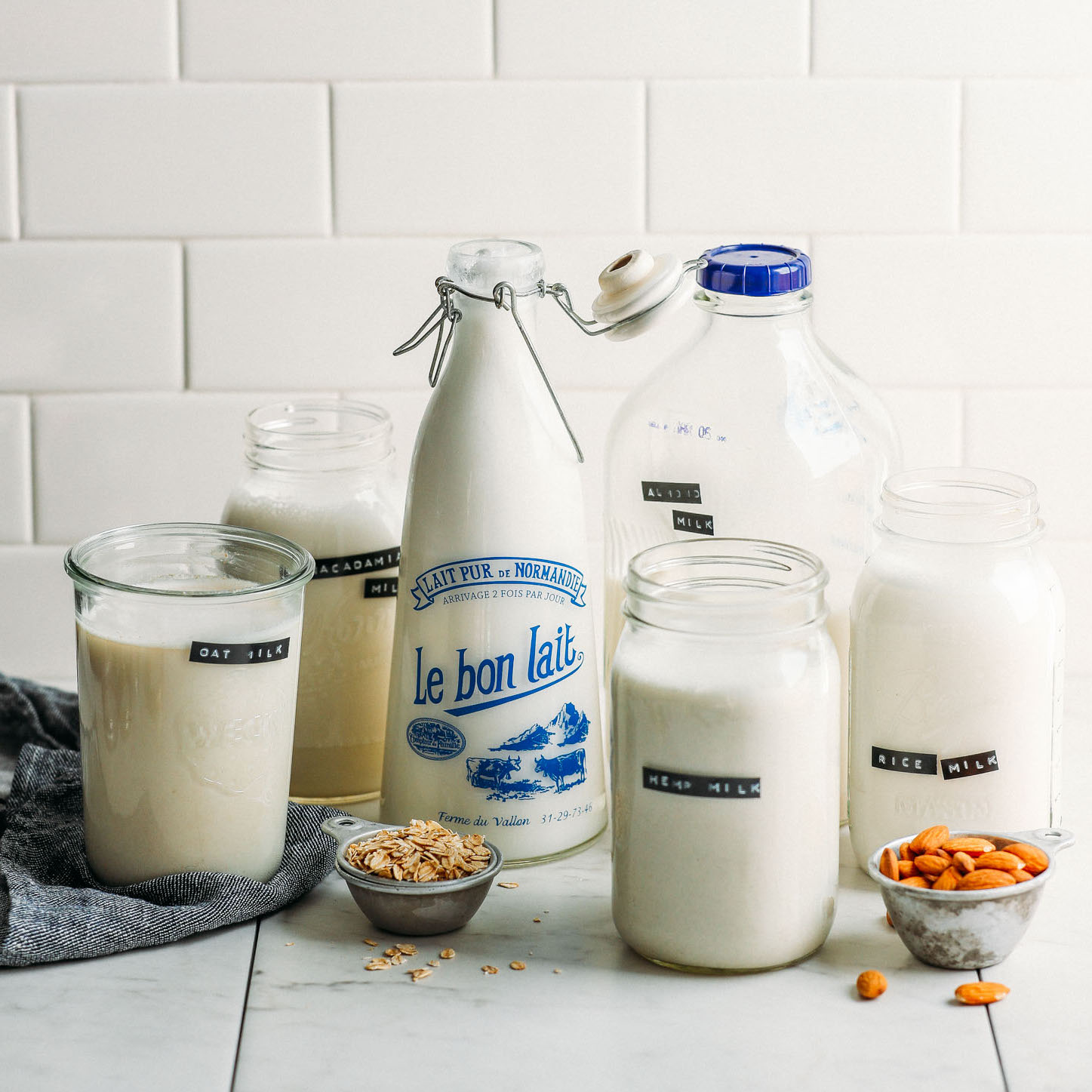 Jars of assorted types of homemade dairy-free milk