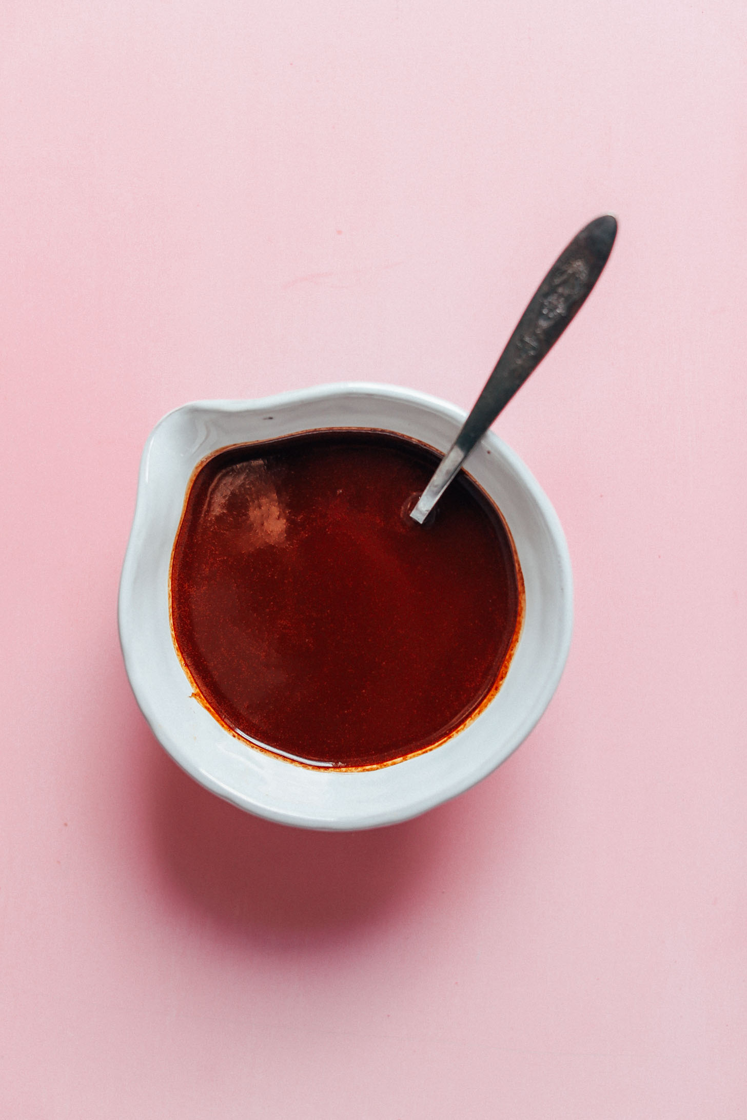 A bowl of homemade chocolate for AMAZING Coconut Butter Cups