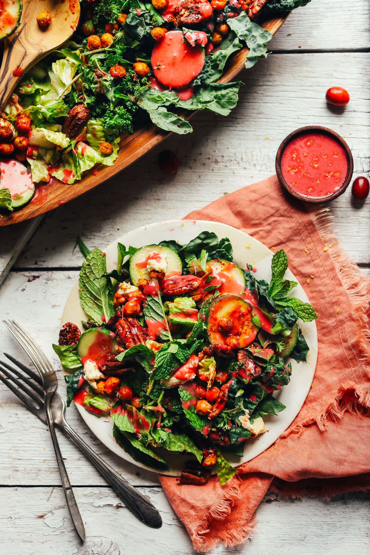 Dinner plate filled with Herbed Green Salad with Cranberry Vinaigrette for a healthy gluten-free plant-based meal