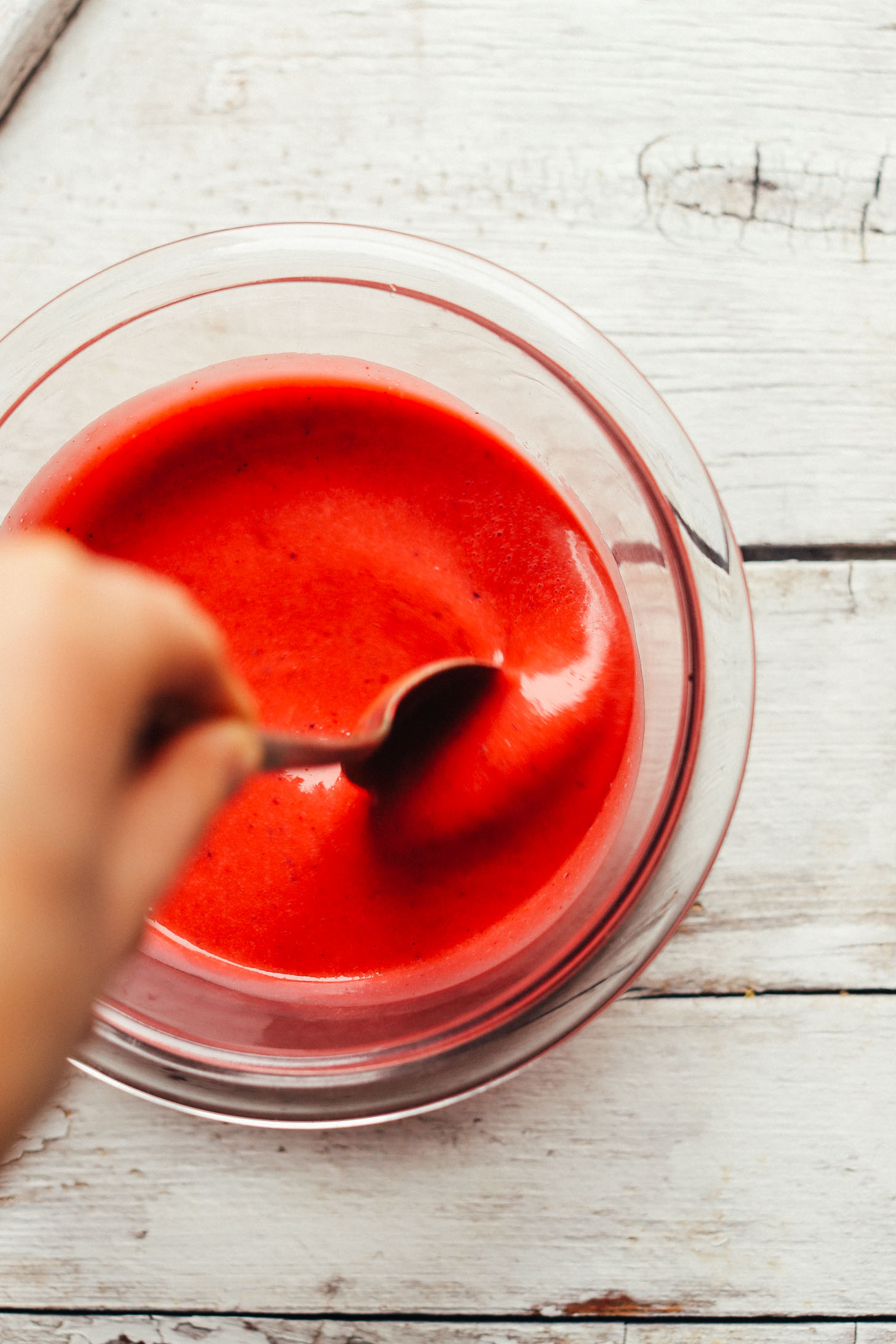 Vibrant red Cranberry Vinaigrette for our vegan Herbed Green Salad