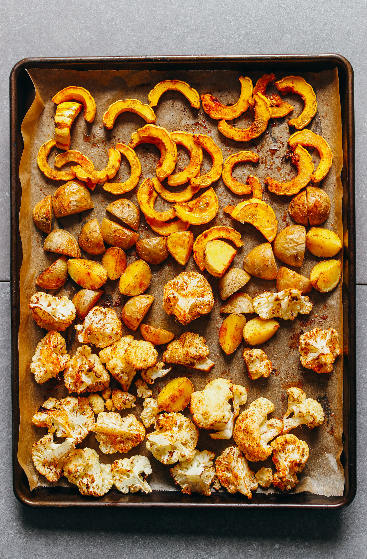 Roasted delicata squash, potatoes, and cauliflower for healthy 30-Minute Roasted Vegetables Tacos with Chimichurri