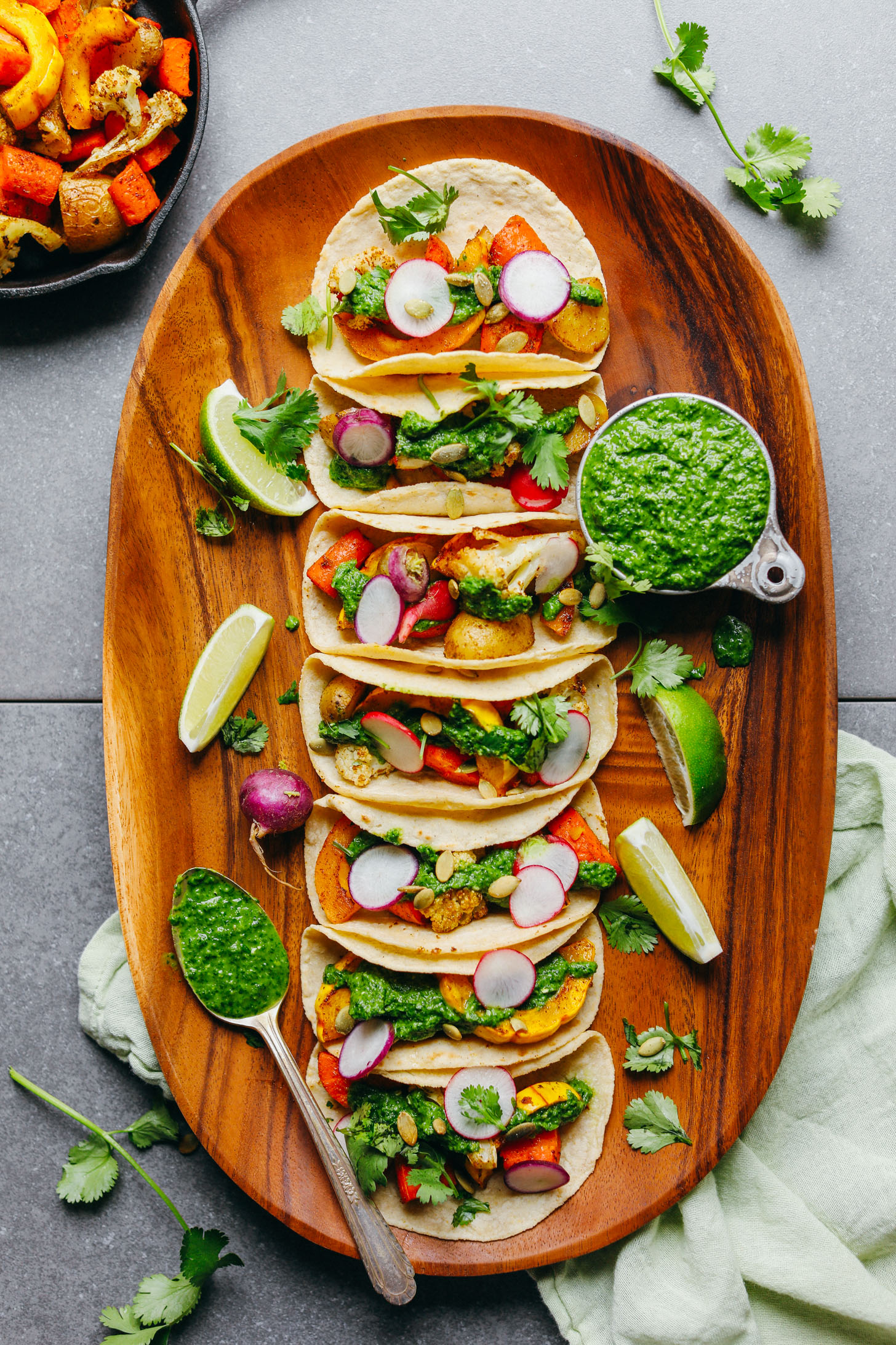 A large platter filled with 30-Minute Roasted Vegetable Tacos with Chimichurri for a healthy gluten-free, plant-based meal