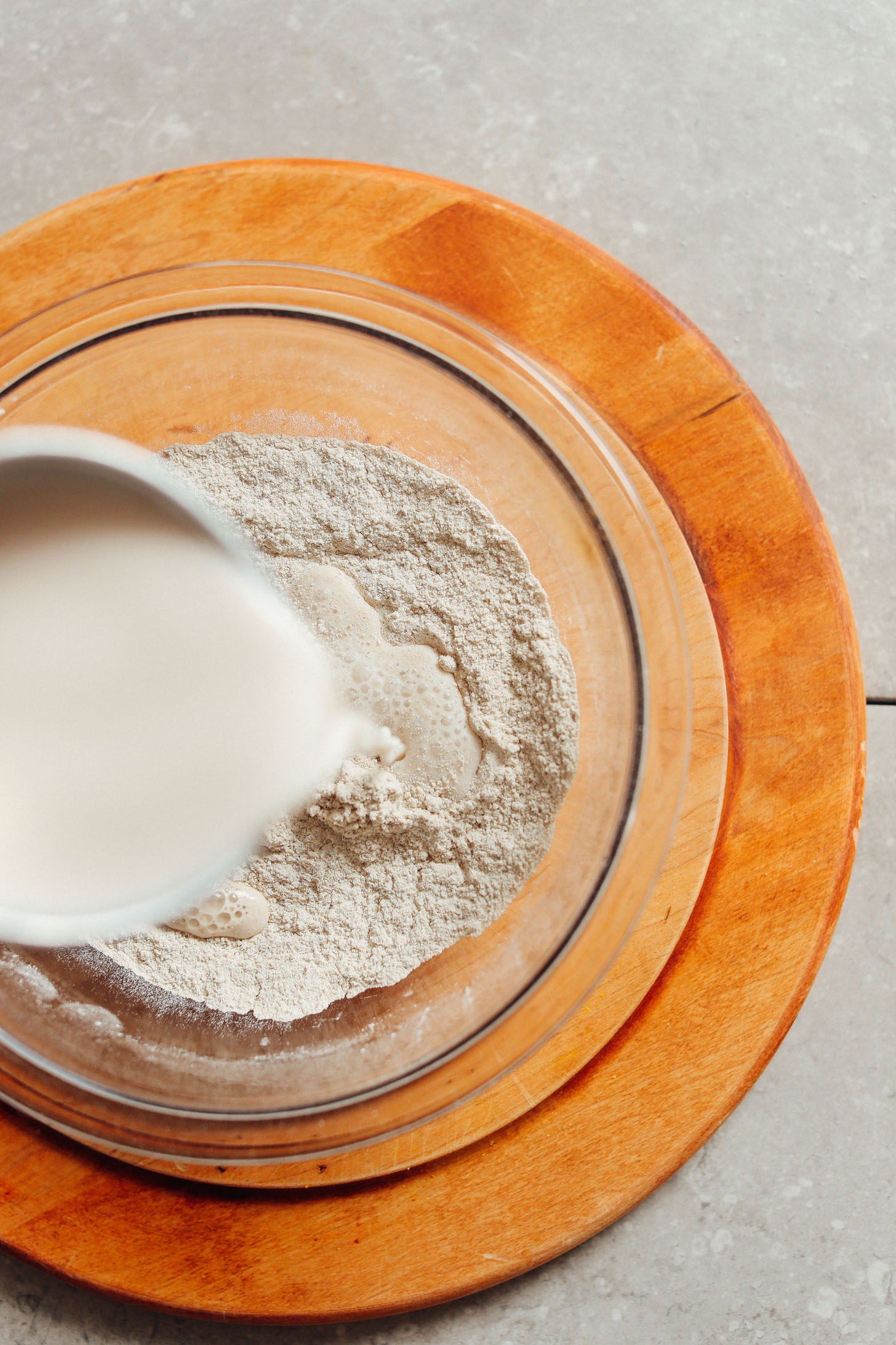 Pouring wet ingredients into dry for making vegan, gluten-free, sugar-free crepes