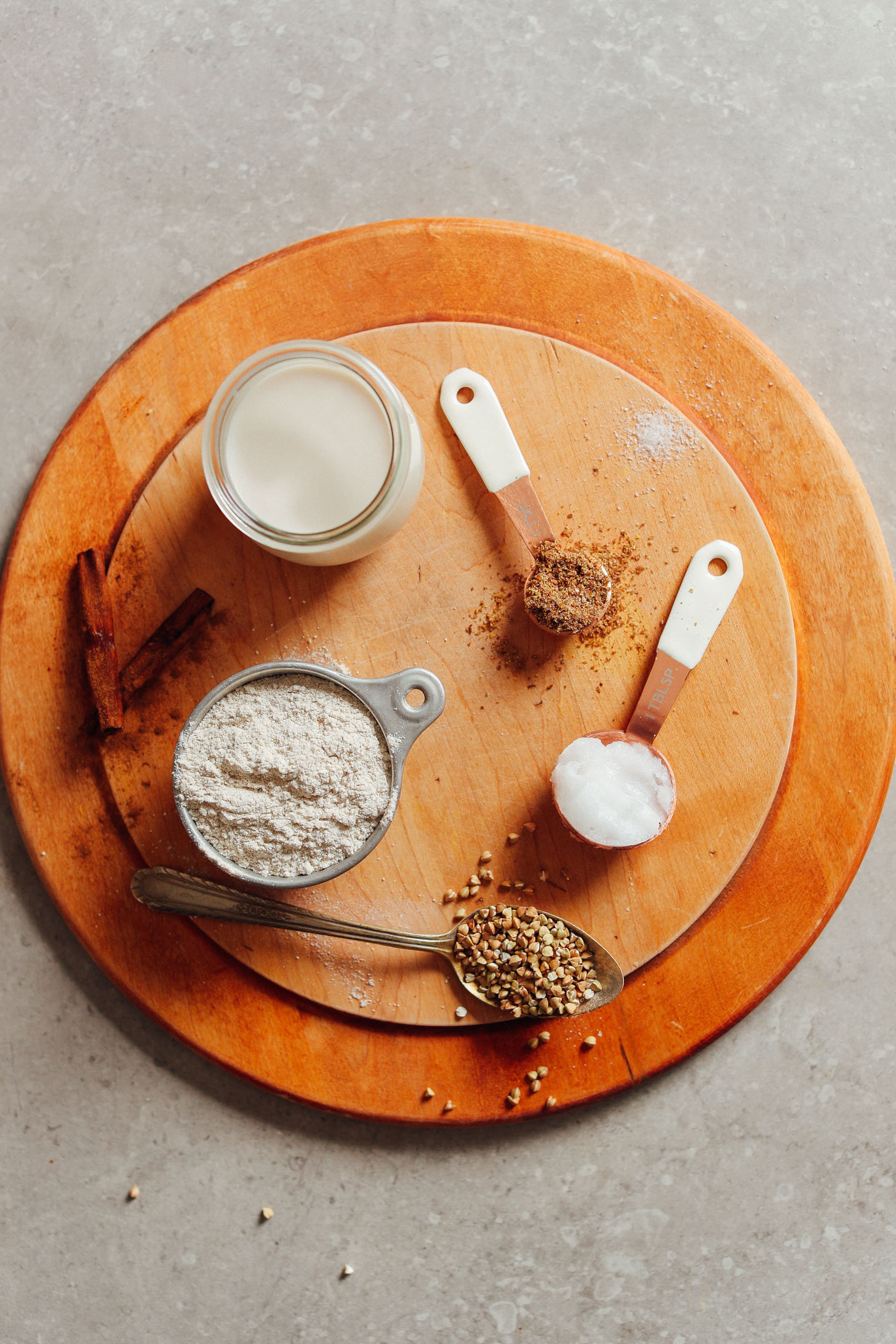 Buckwheat, coconut oil, flaxseed meal, nut milk, and cinnamon for making Vegan Buckwheat Crepes