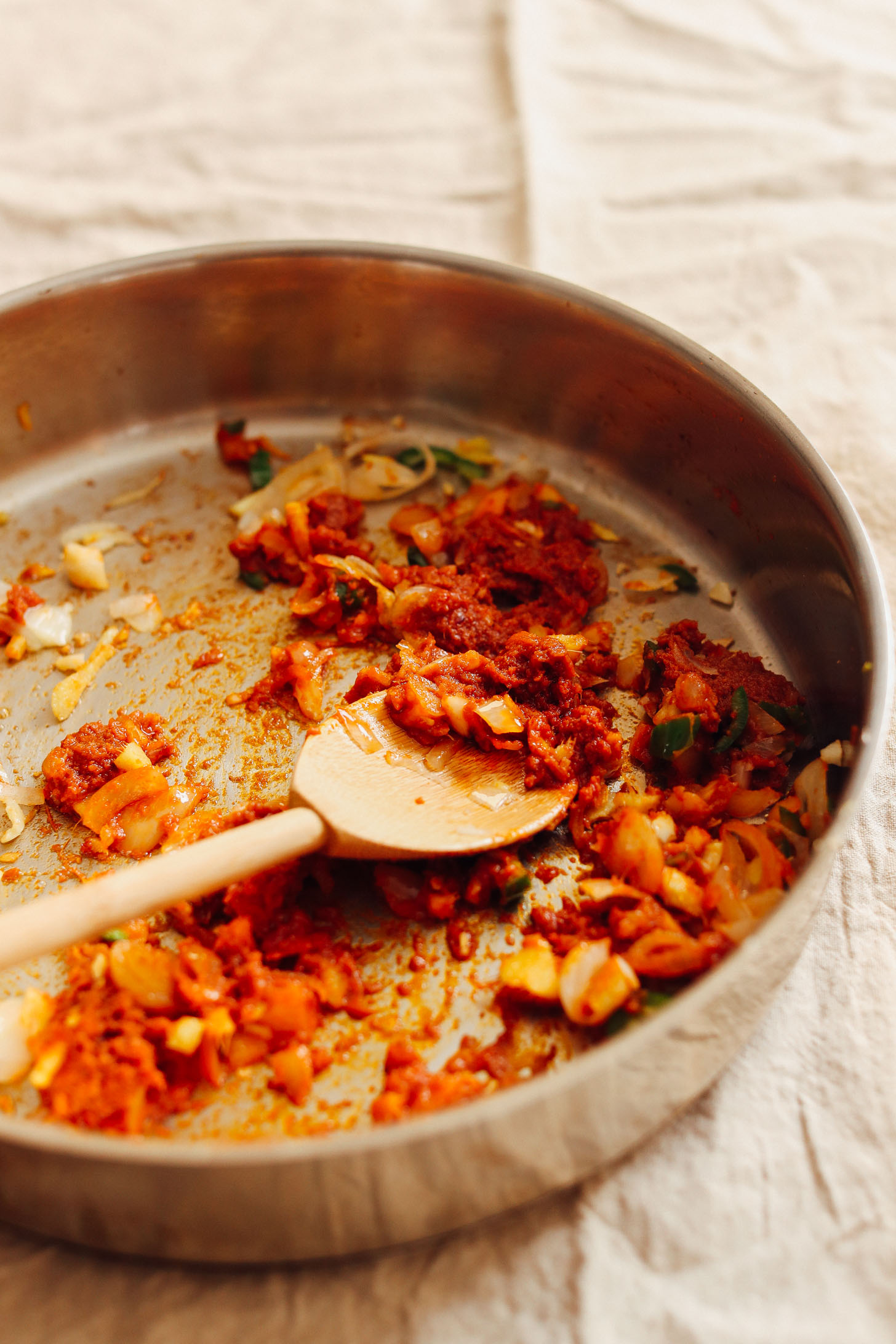Sauteing shallots, garlic, ginger, and curry paste for Rich Red Curry with Roasted Vegetables