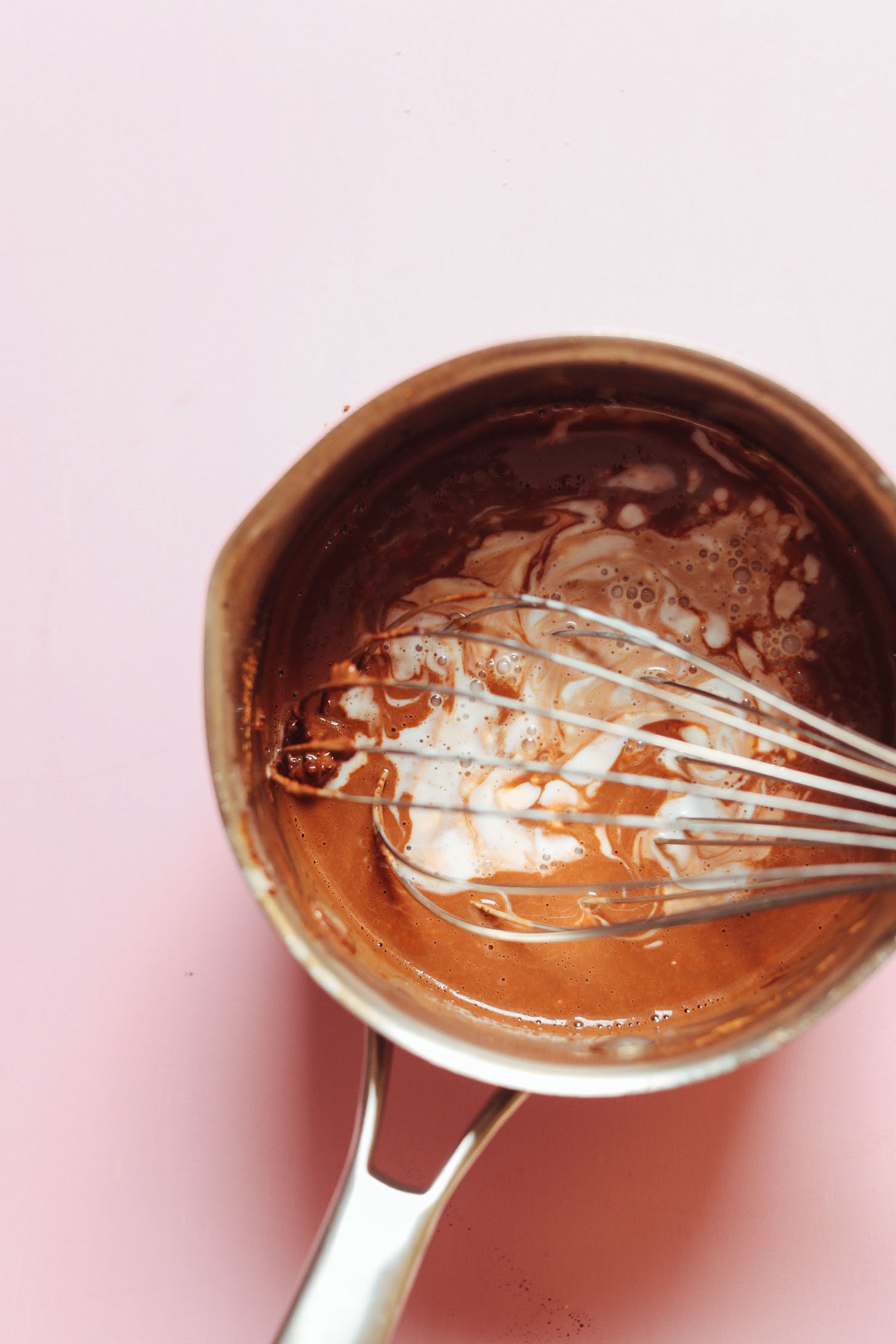 Whisking ingredients in a saucepan for gluten-free Vegan Chocolate Mousse