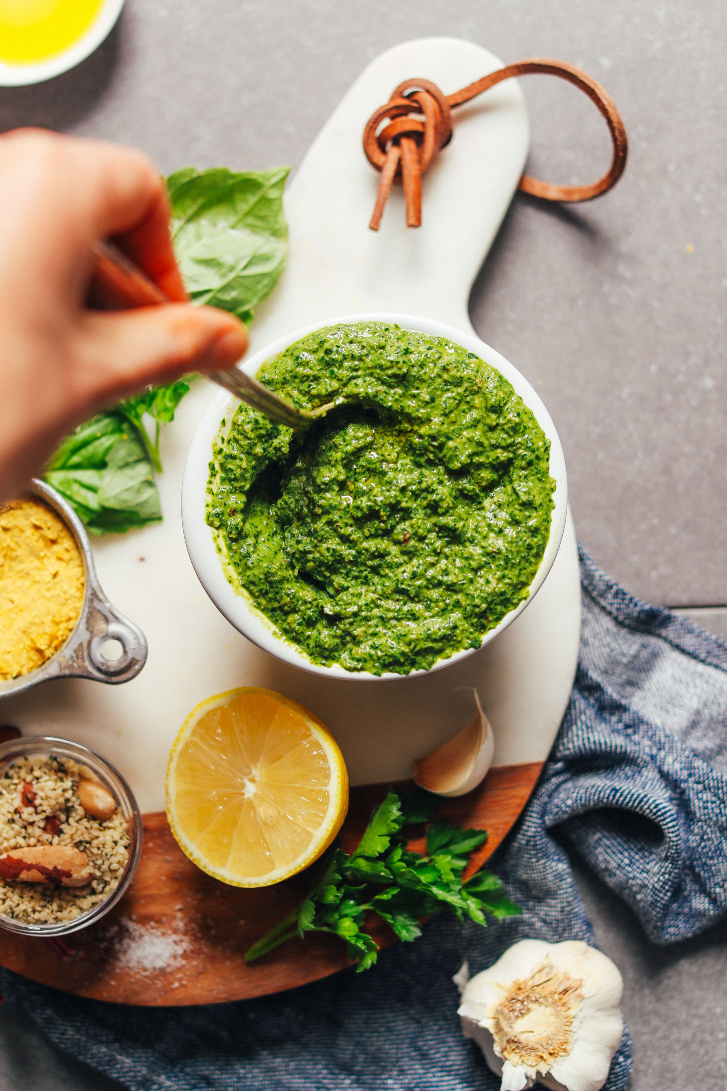 HEALTHY Super Green Vegan Pesto! BIG flavor, 10 minutes, 1 bowl, SO delicious. #vegan #glutenfree #plantbased #sauce #pesto #greens #minimalistbaker #recipe