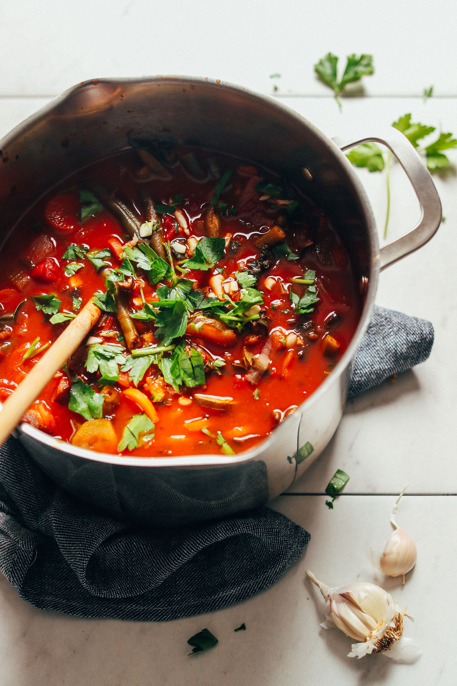 A big pot loaded with vegetables and broth for our Fire-Roasted Tomato Veggie Mung Bean Soup