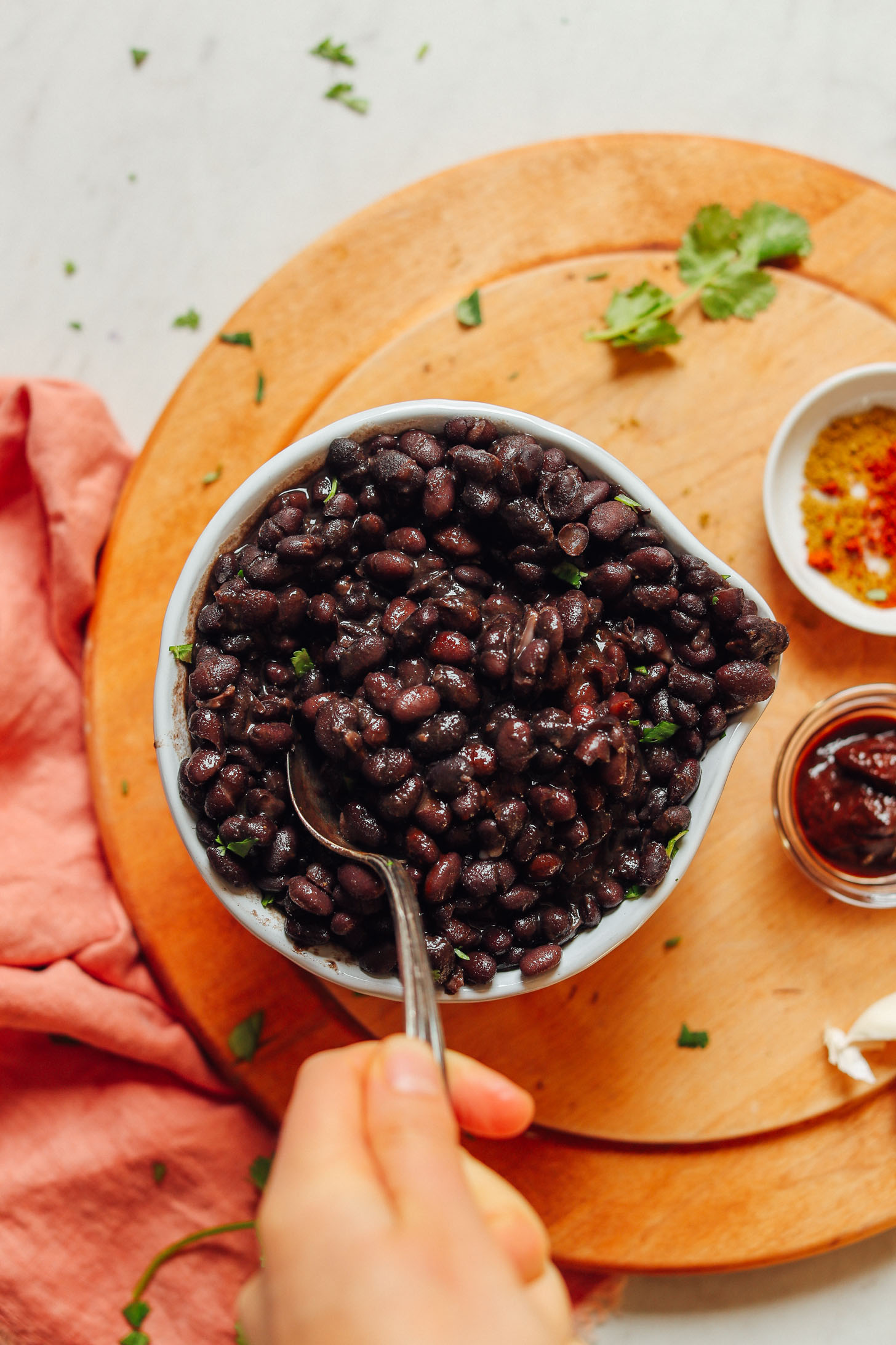 Big serving bowl filled with perfectly tender homemade black beans