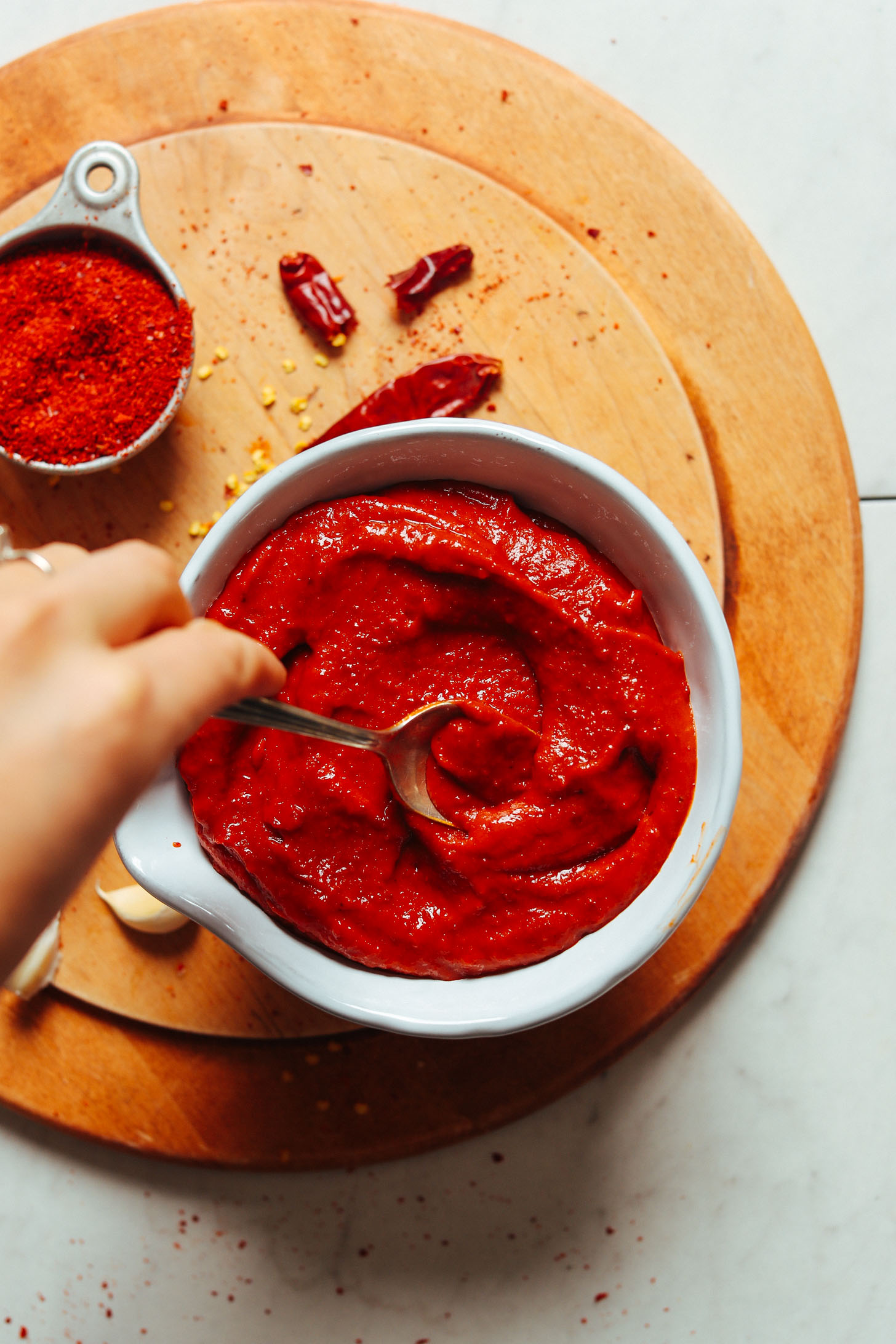 Grabbing a spoonful of homemade Gochujang sauce