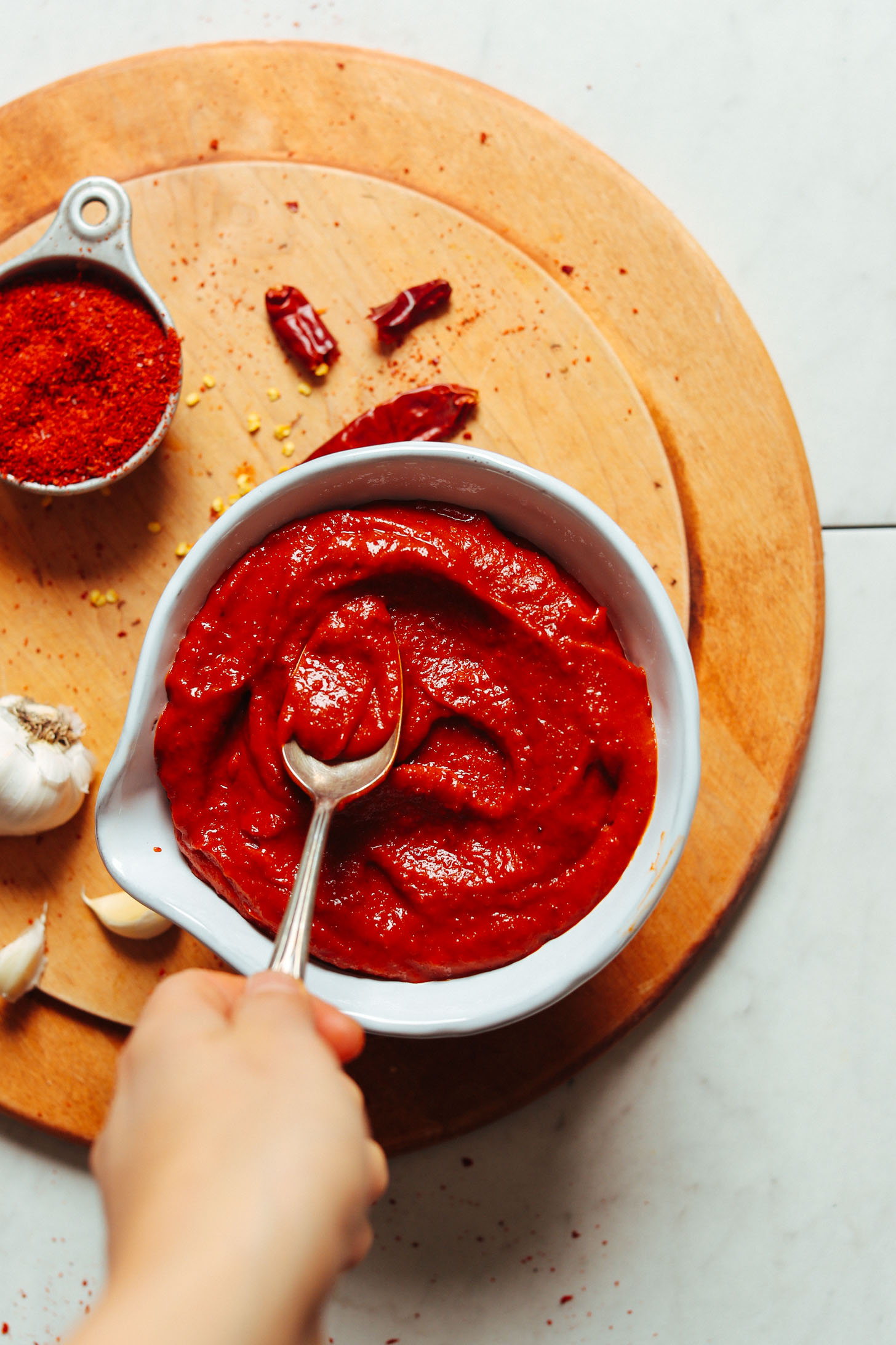 Vintage spoon in a bowl of homemade Korean-Inspired Gochujang sauce