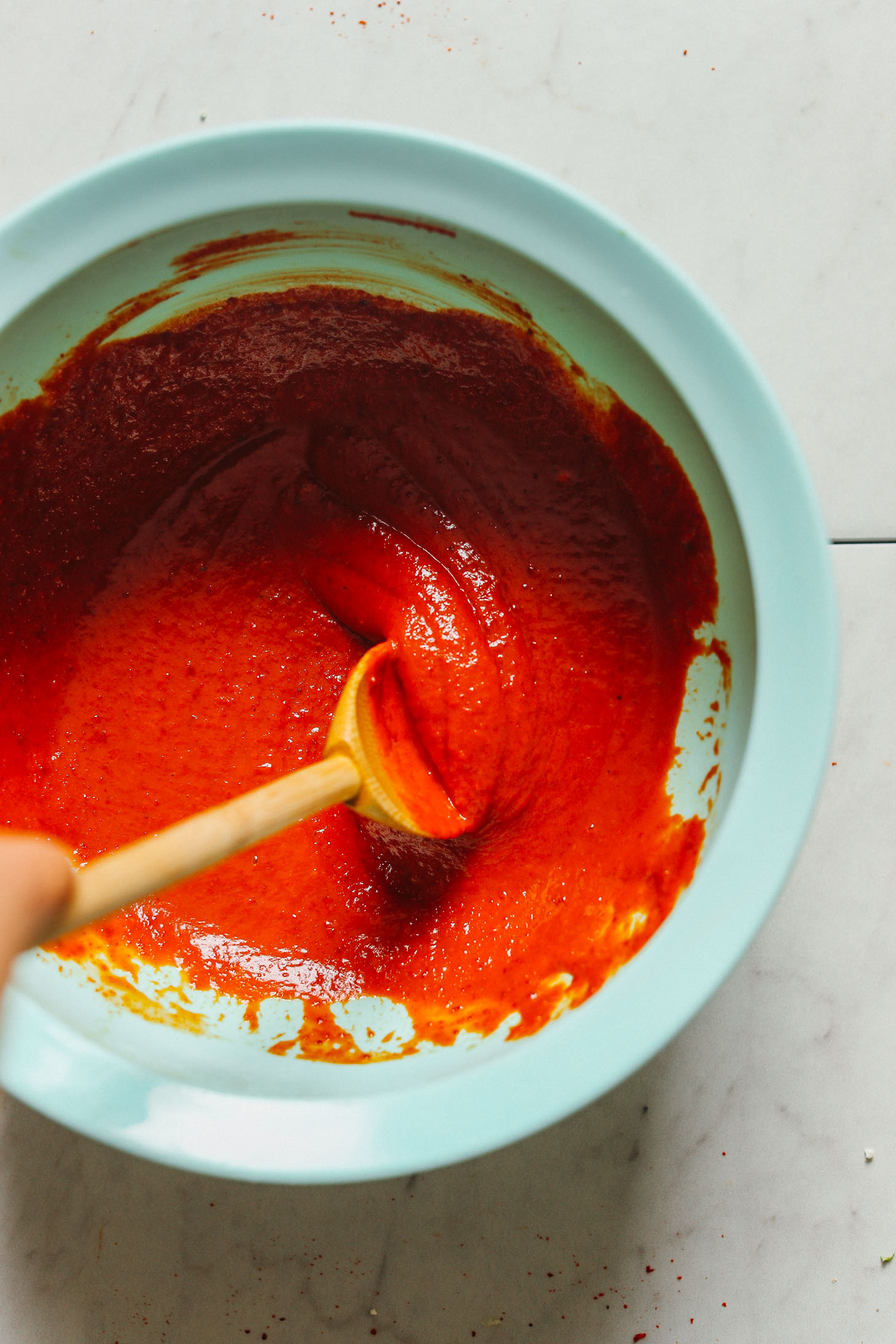 Stirring together the sauce for gluten-free vegan Korean-Spiced Cauliflower Wings