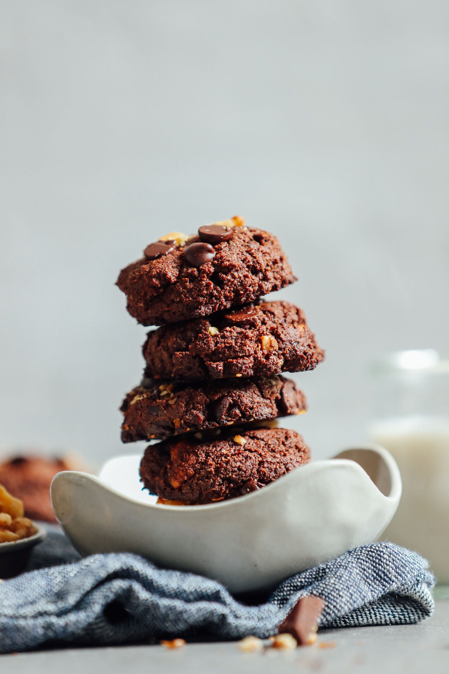 Serving bowl stacked with fudgy chocolaty Vegan Brownie Cookies