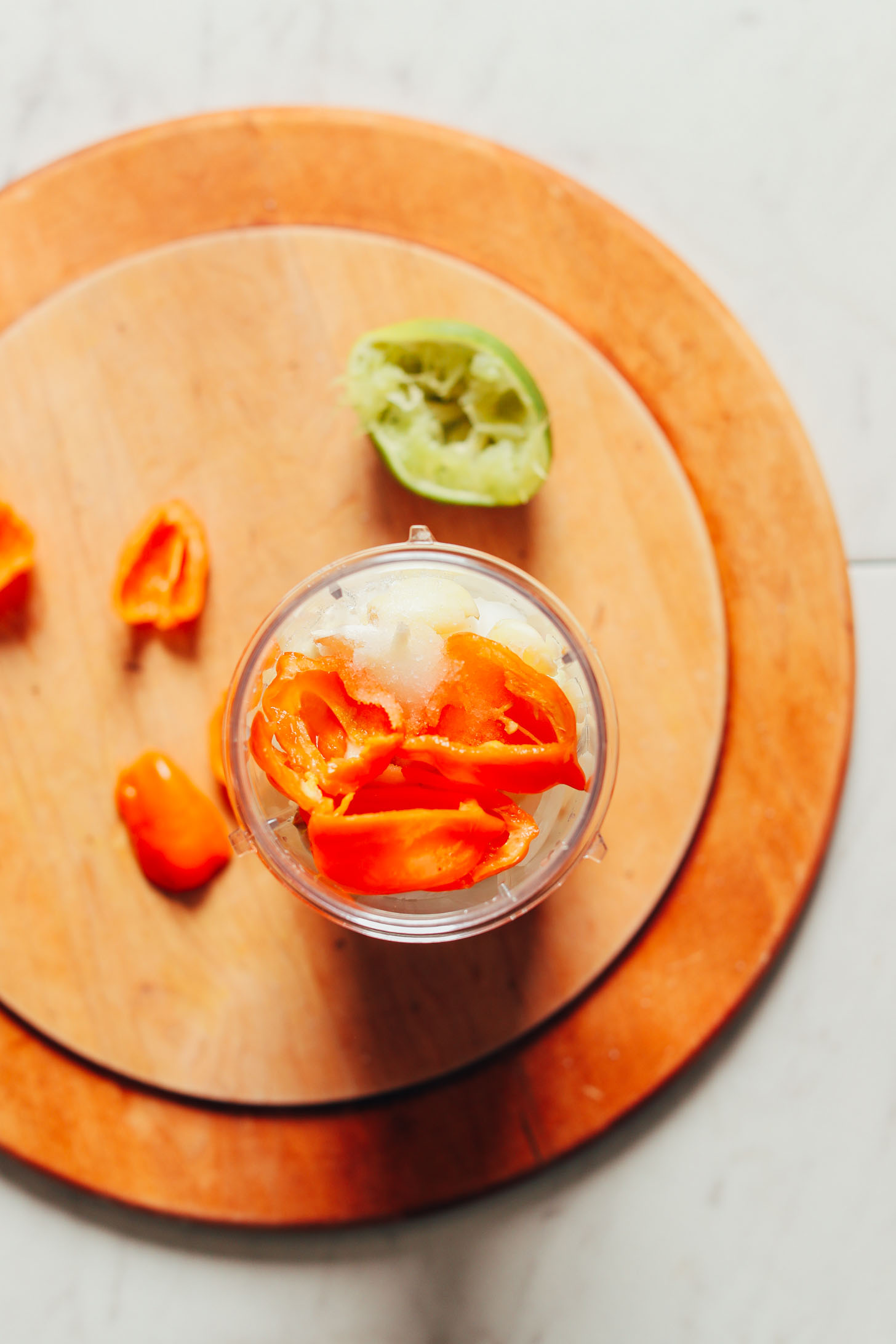 Ingredients in a nutribullet for making homemade hot sauce