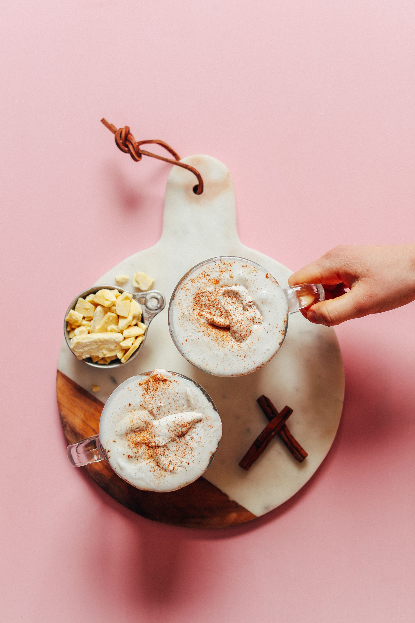 Grabbing a mug of our delicious Vegan White Hot Chocolate for dessert