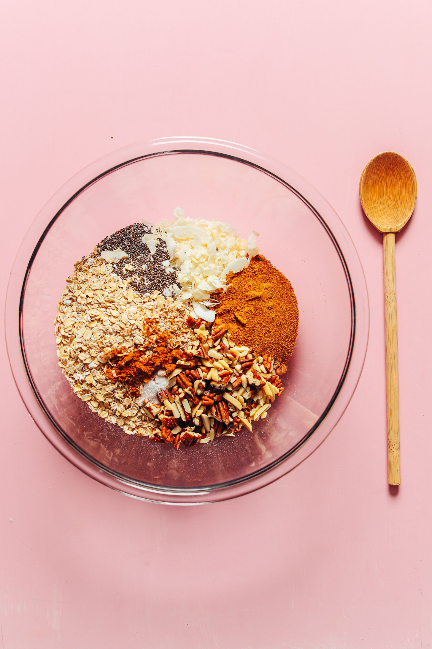 Mixing bowl filled with ingredients for making homemade gluten-free granola