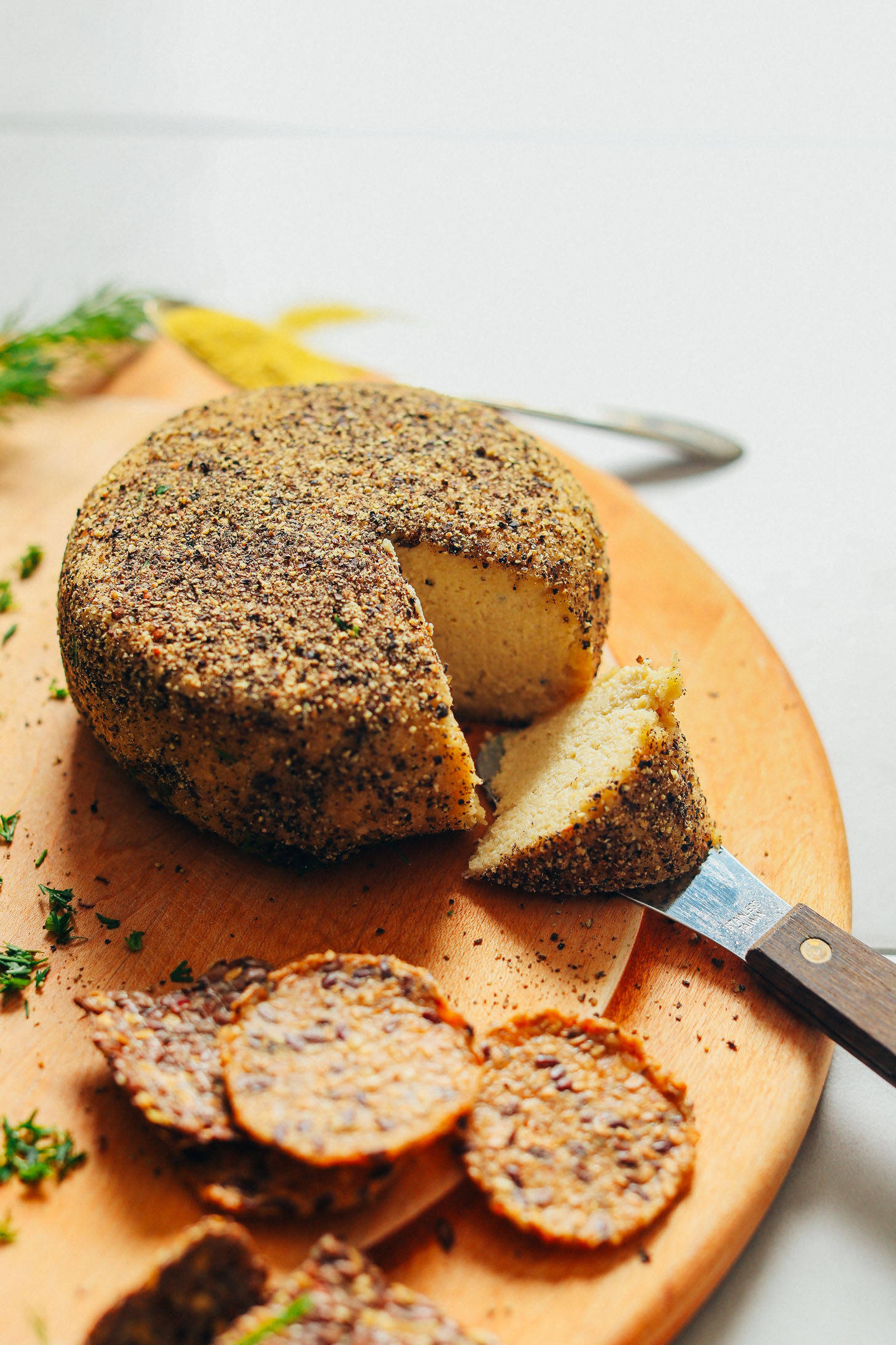 Homemade vegan cheese wheel for our Guide to Vegan Cheese post