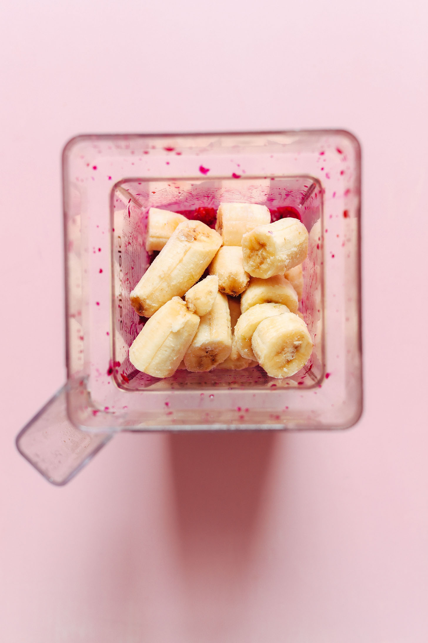 Blender filled with ingredients for making a healthy Dragon Fruit Smoothie Bowl for breakfast