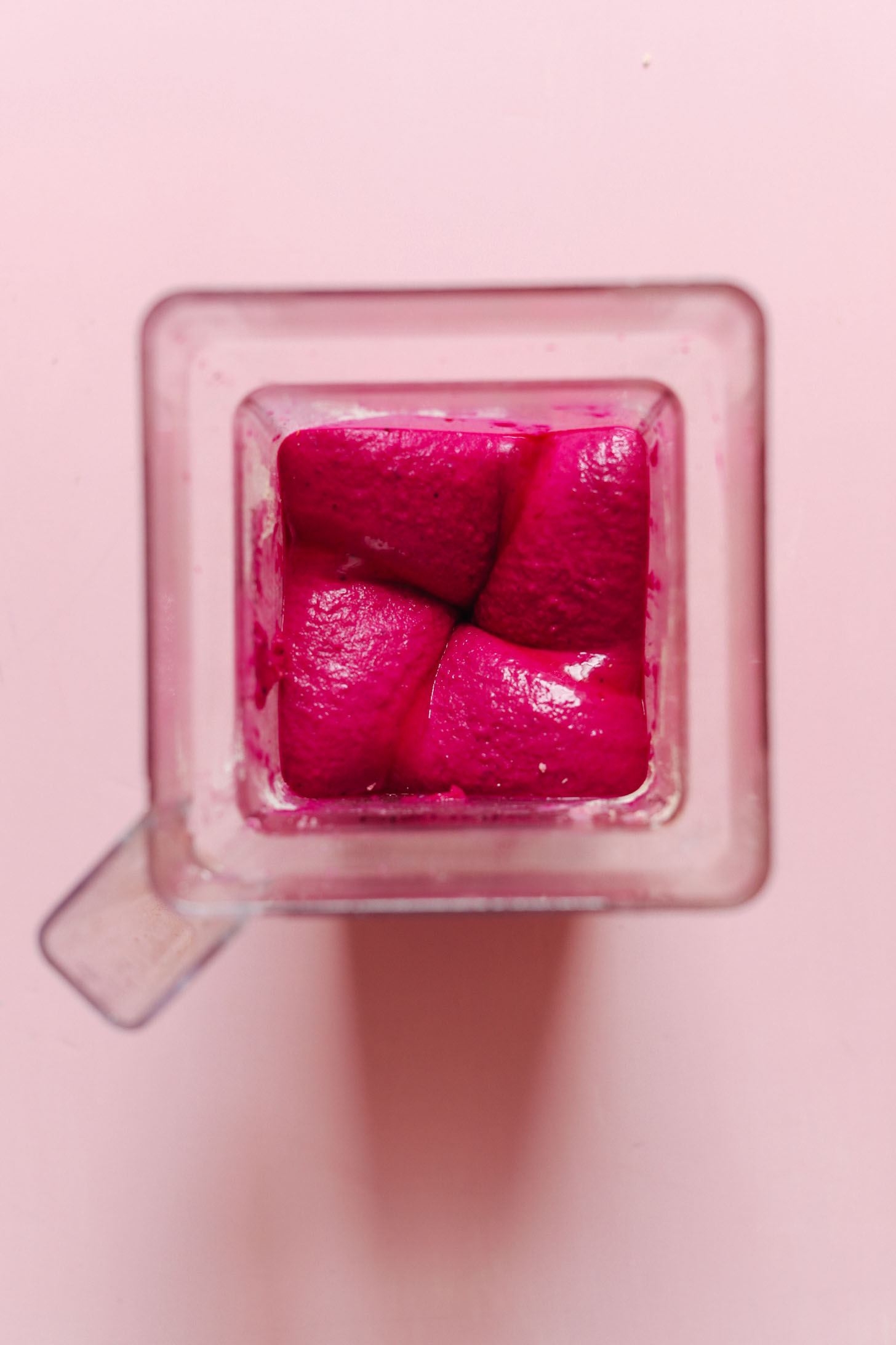 Vibrantly colored Dragon Fruit Smoothie in a blender