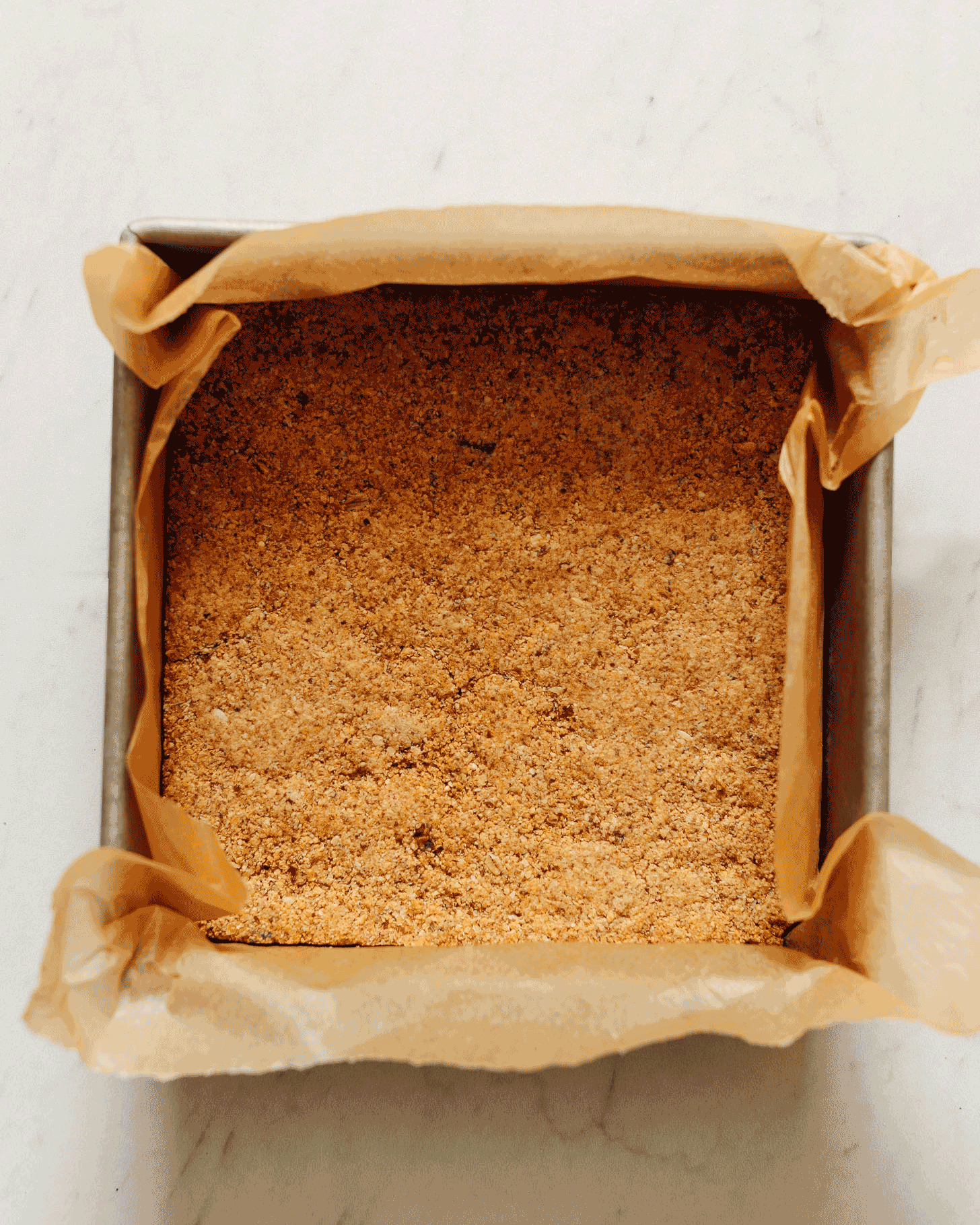 Time lapse creation showing the layering of these salty-sweet Vegan 7 Layer Bars