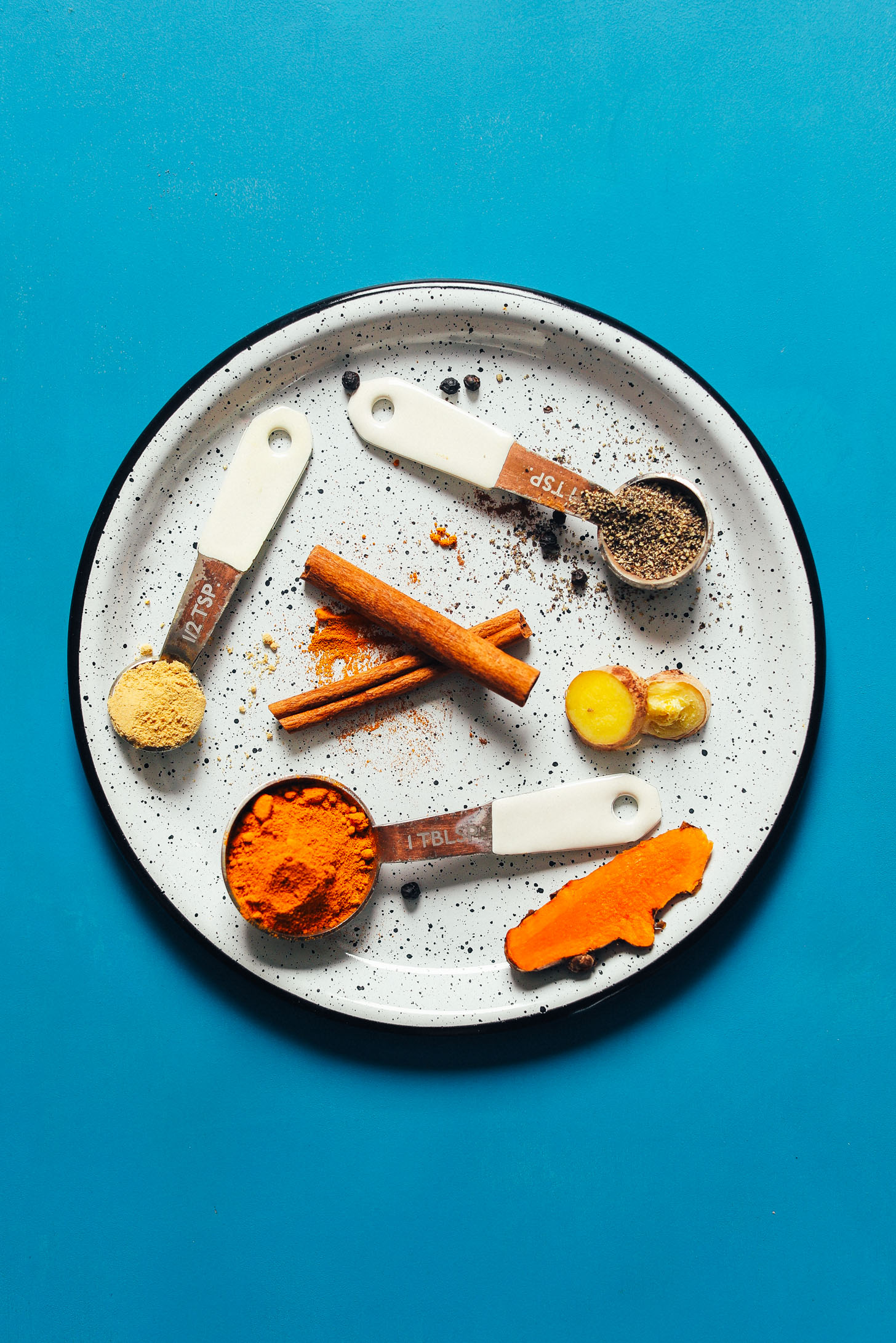 Ginger, turmeric, and other spices for making our homemade golden milk mix recipe