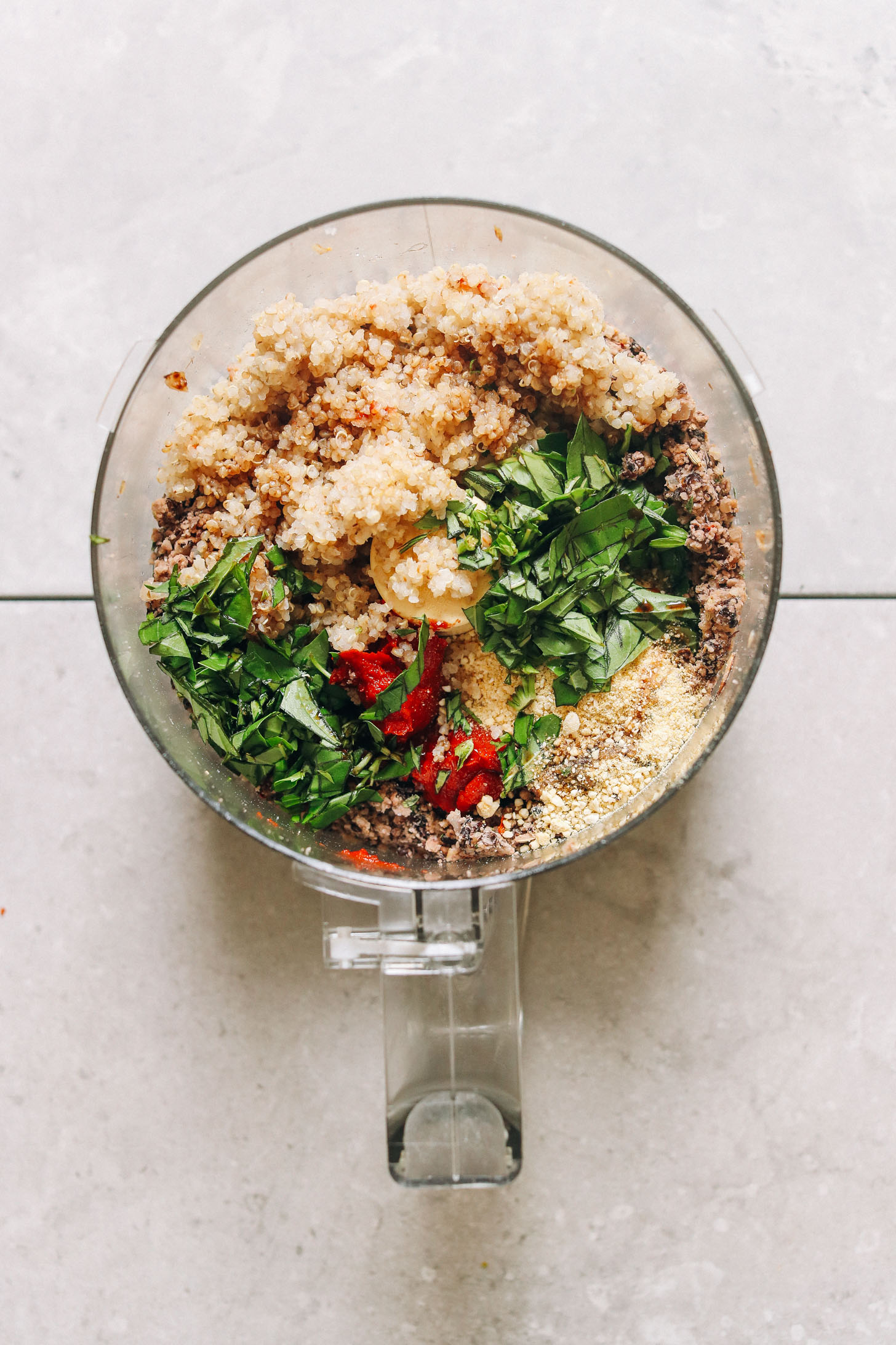 Food processor with ingredients for making our vegan meatballs recipe