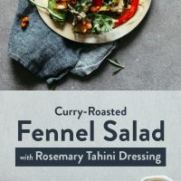 Platter and plate of Curry Roasted Fennel Salad with a drizzle and bowl of Rosemary Tahini Dressing